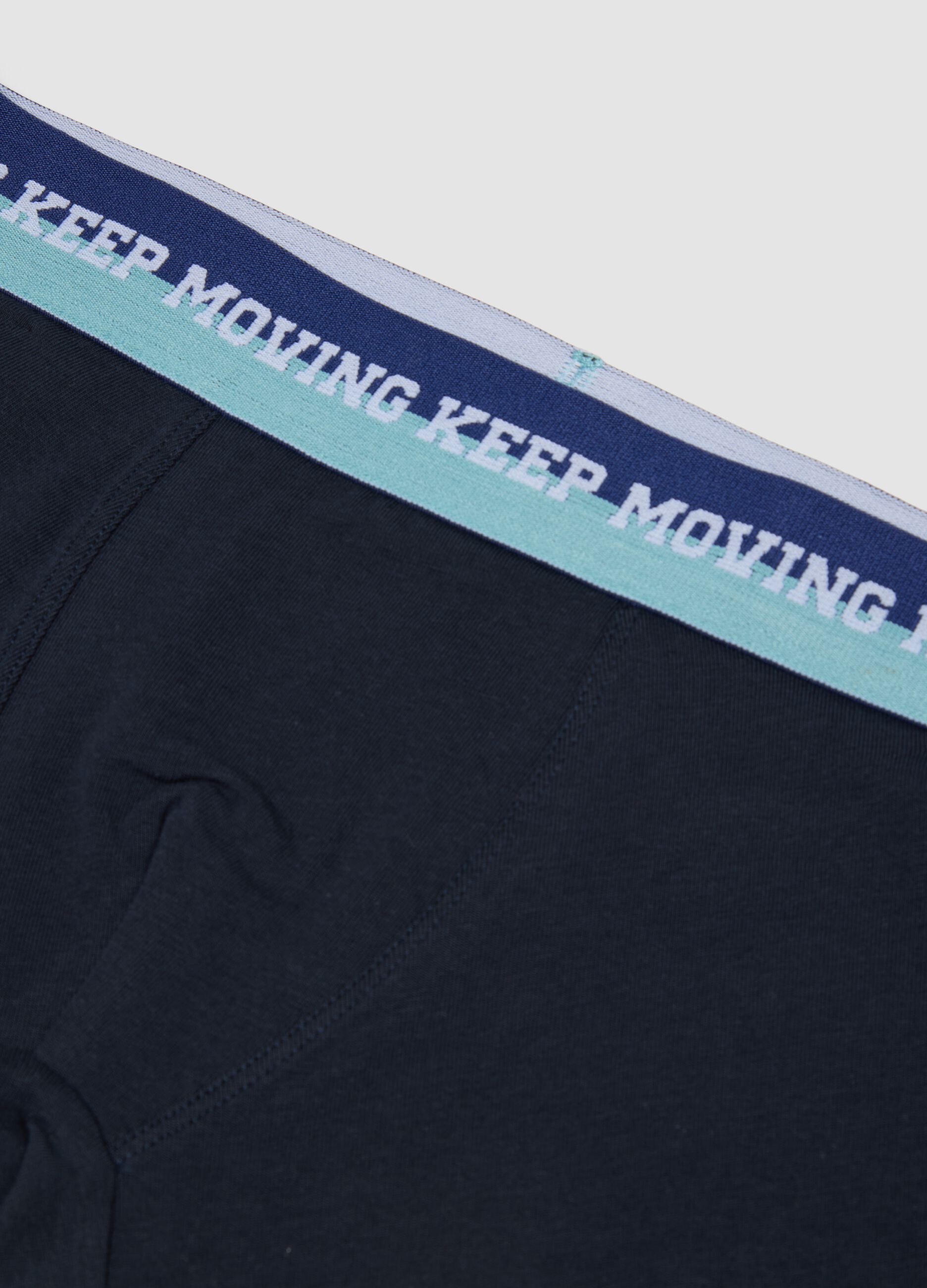 Triple pack of navy blue mid-length boys&rsquo; boxers in stretch organic cotton