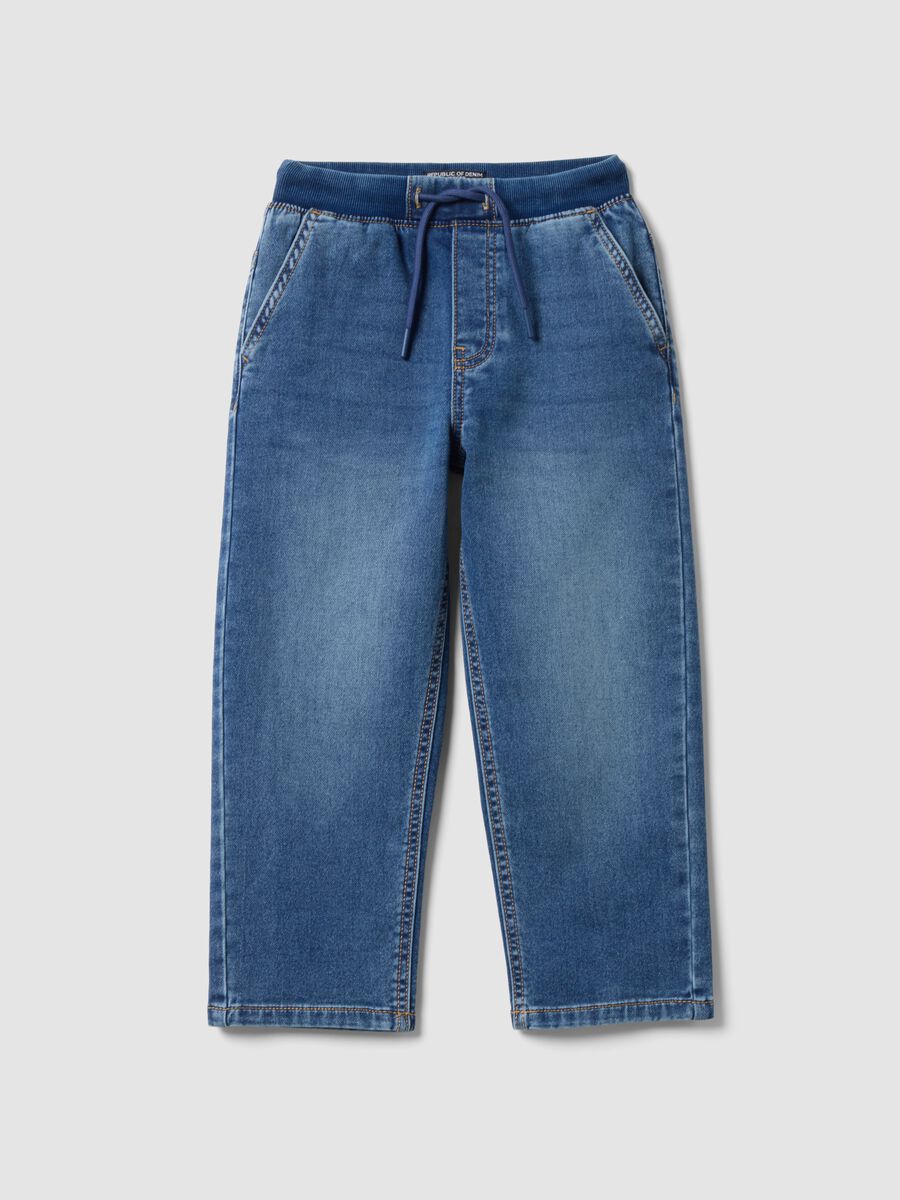 Jogger denim blu in cotone elasticizzato con vita elasticizzata per bambino_0