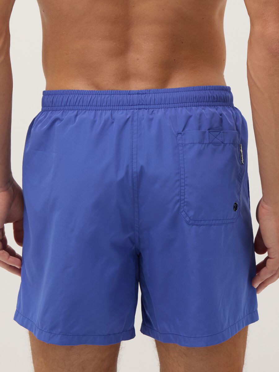 Blue swim shorts with elasticated waistband and drawstring_3