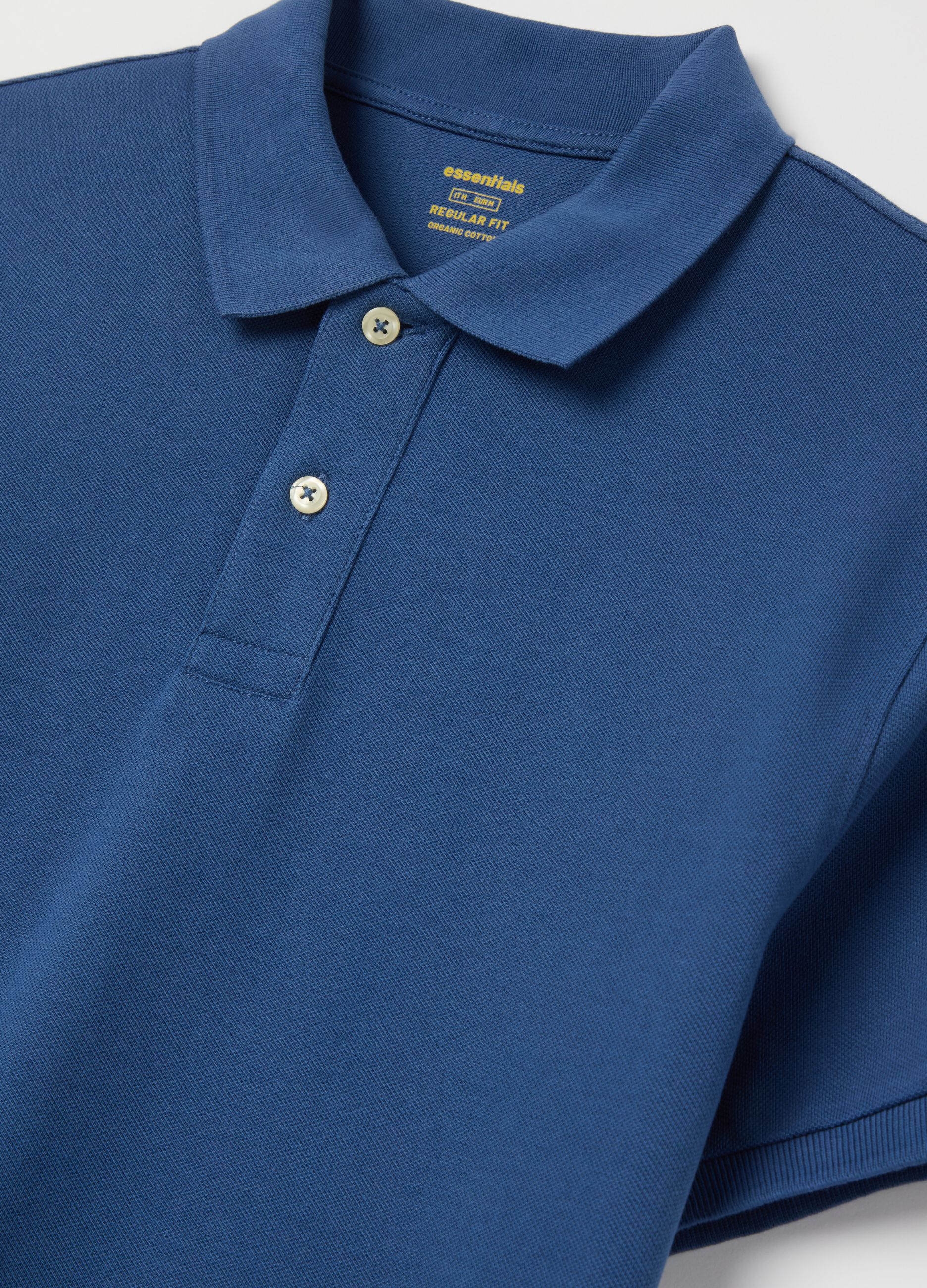 Solid colour polo shirt in organic cotton