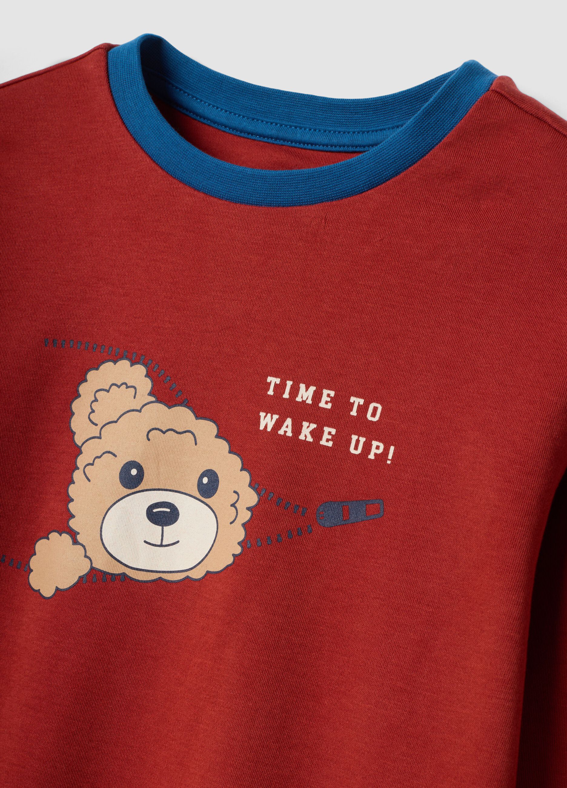 Red organic cotton pyjamas with crew neck and teddy print
