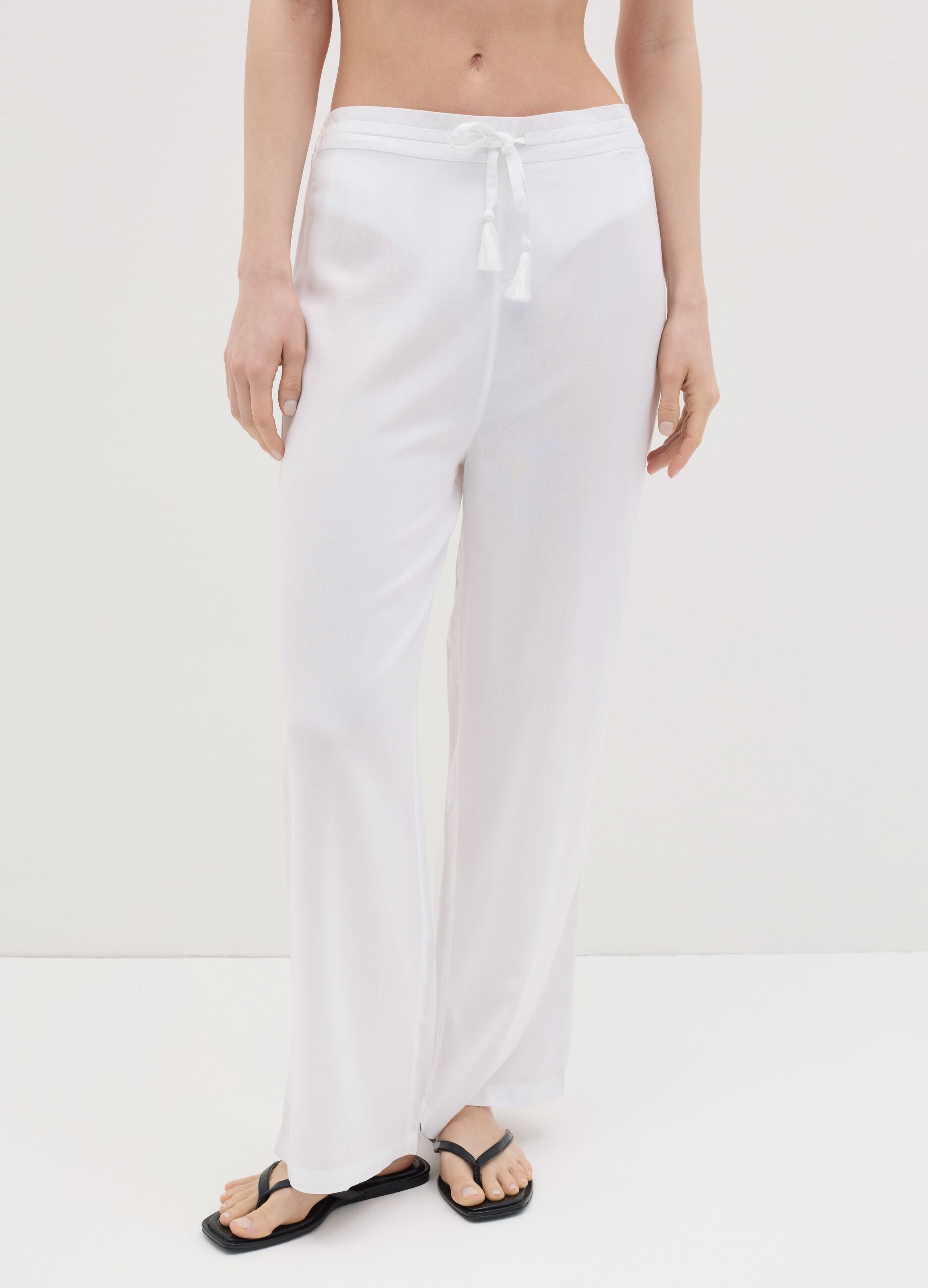 Long white beach cover-up trousers with drawstring