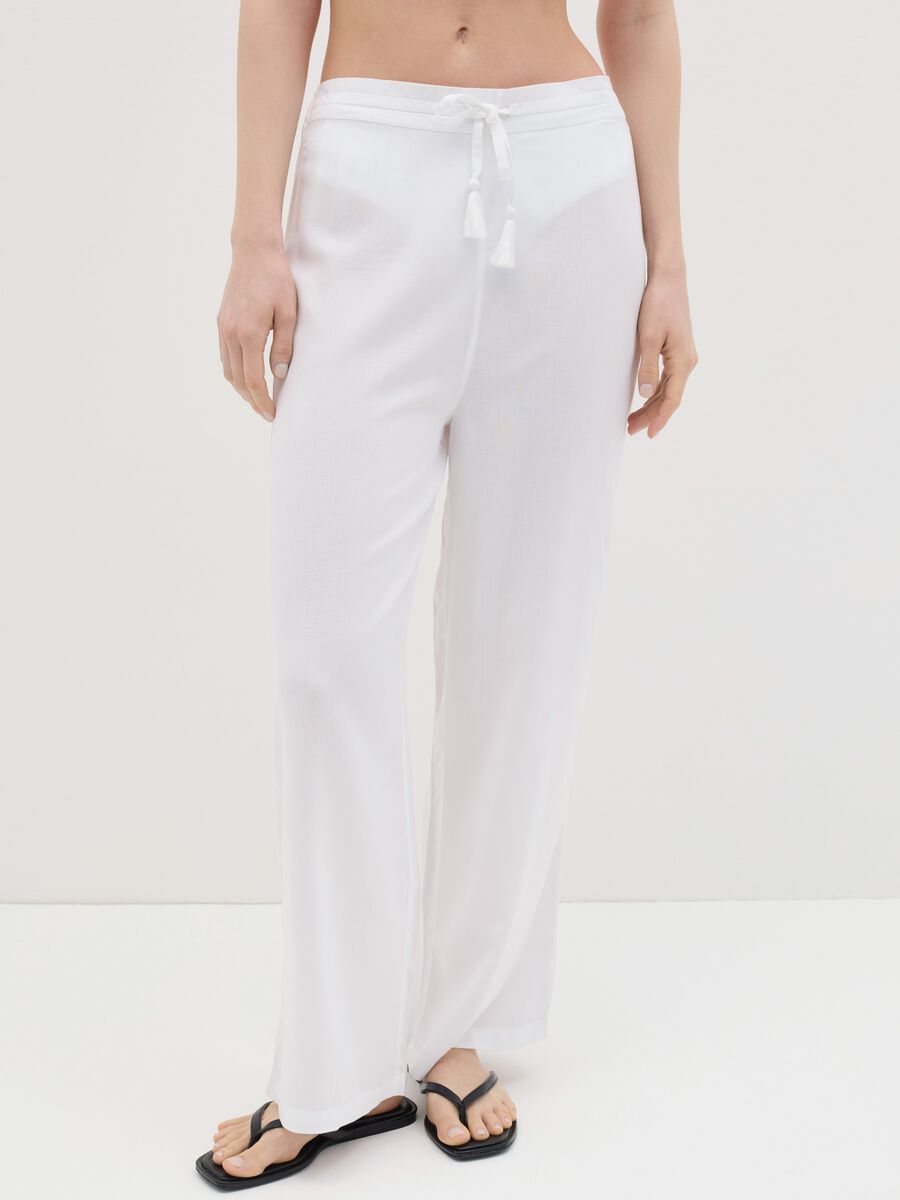 Long white beach cover-up trousers with drawstring_1
