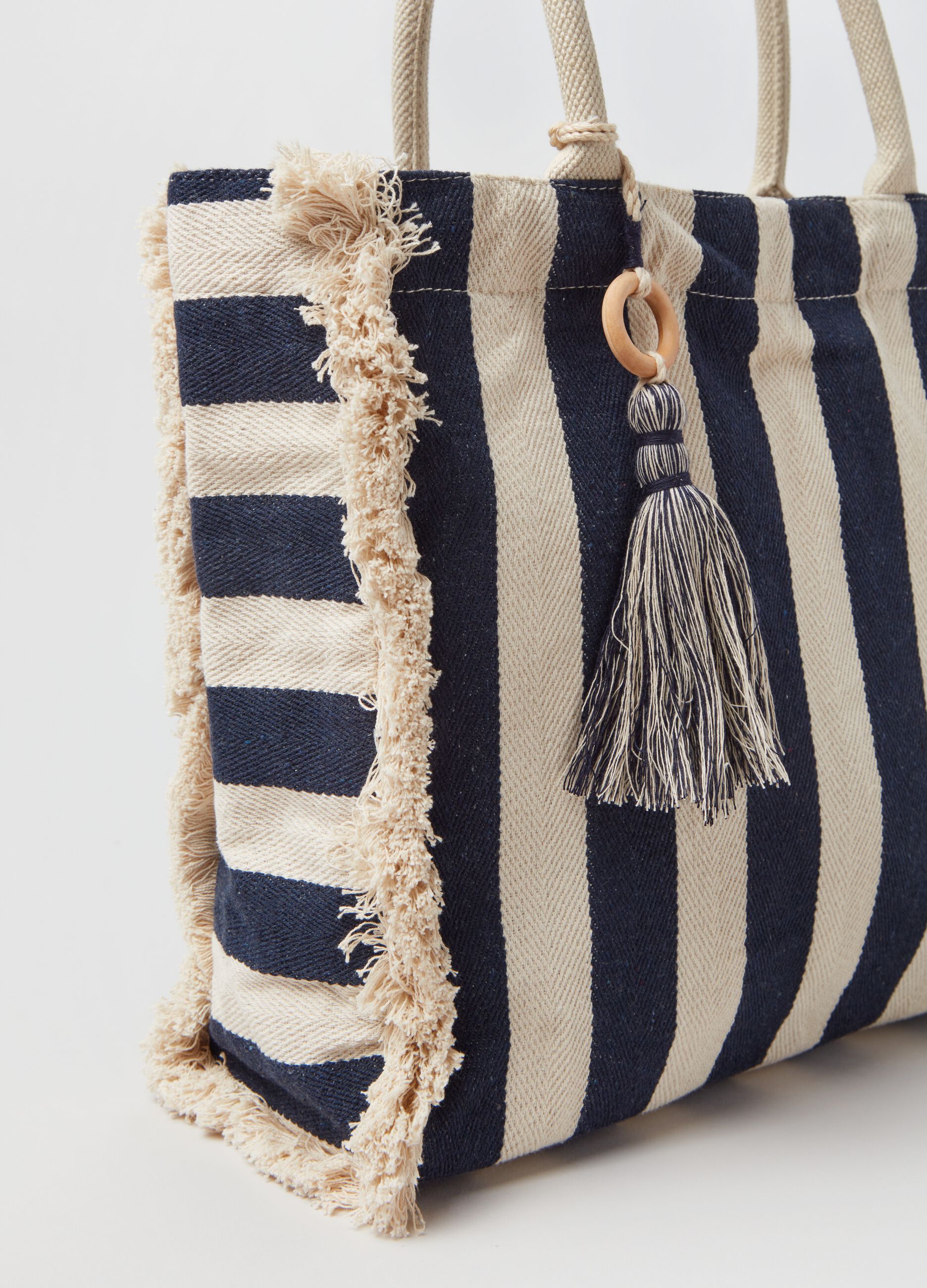 Striped bag with tassel