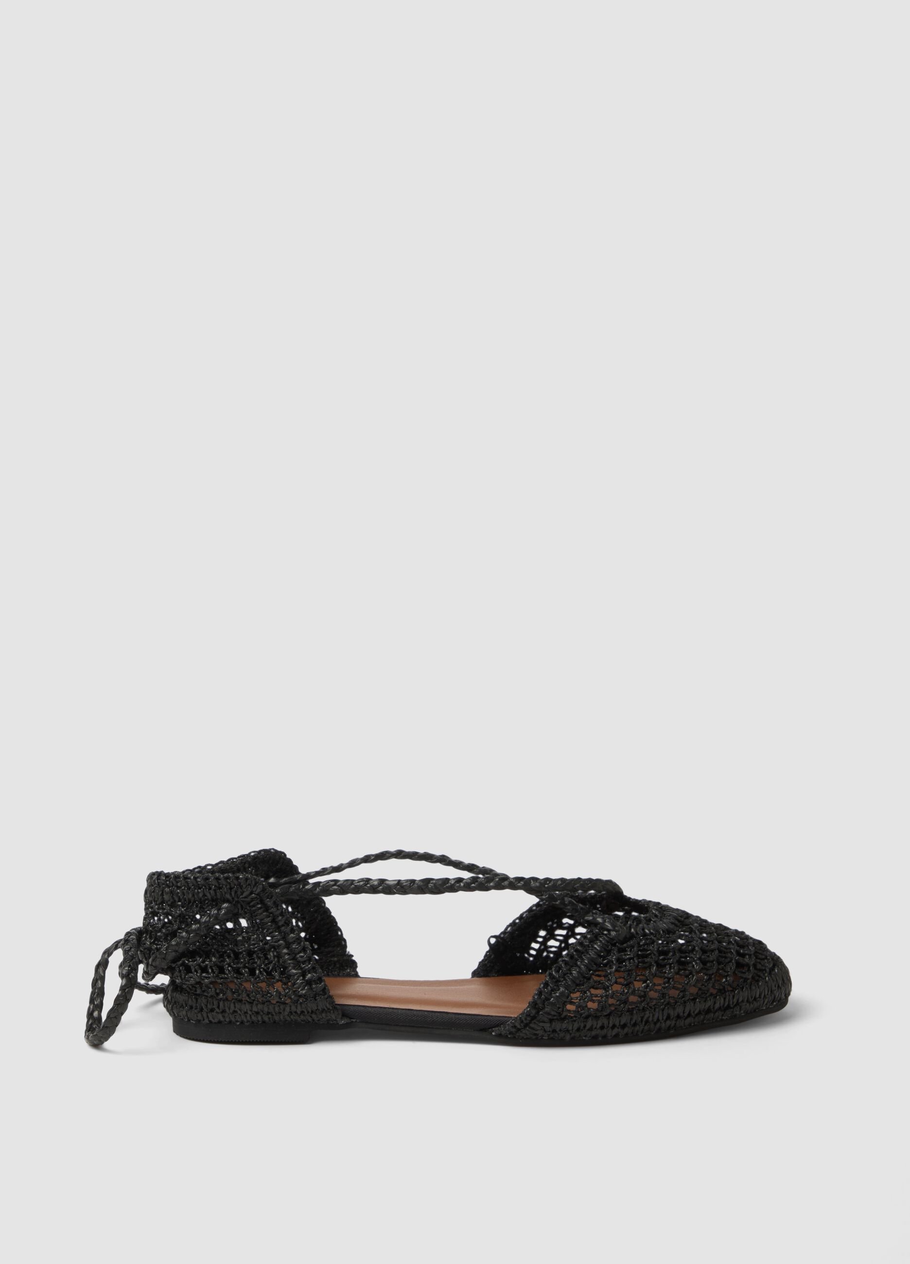 Black woven sandals