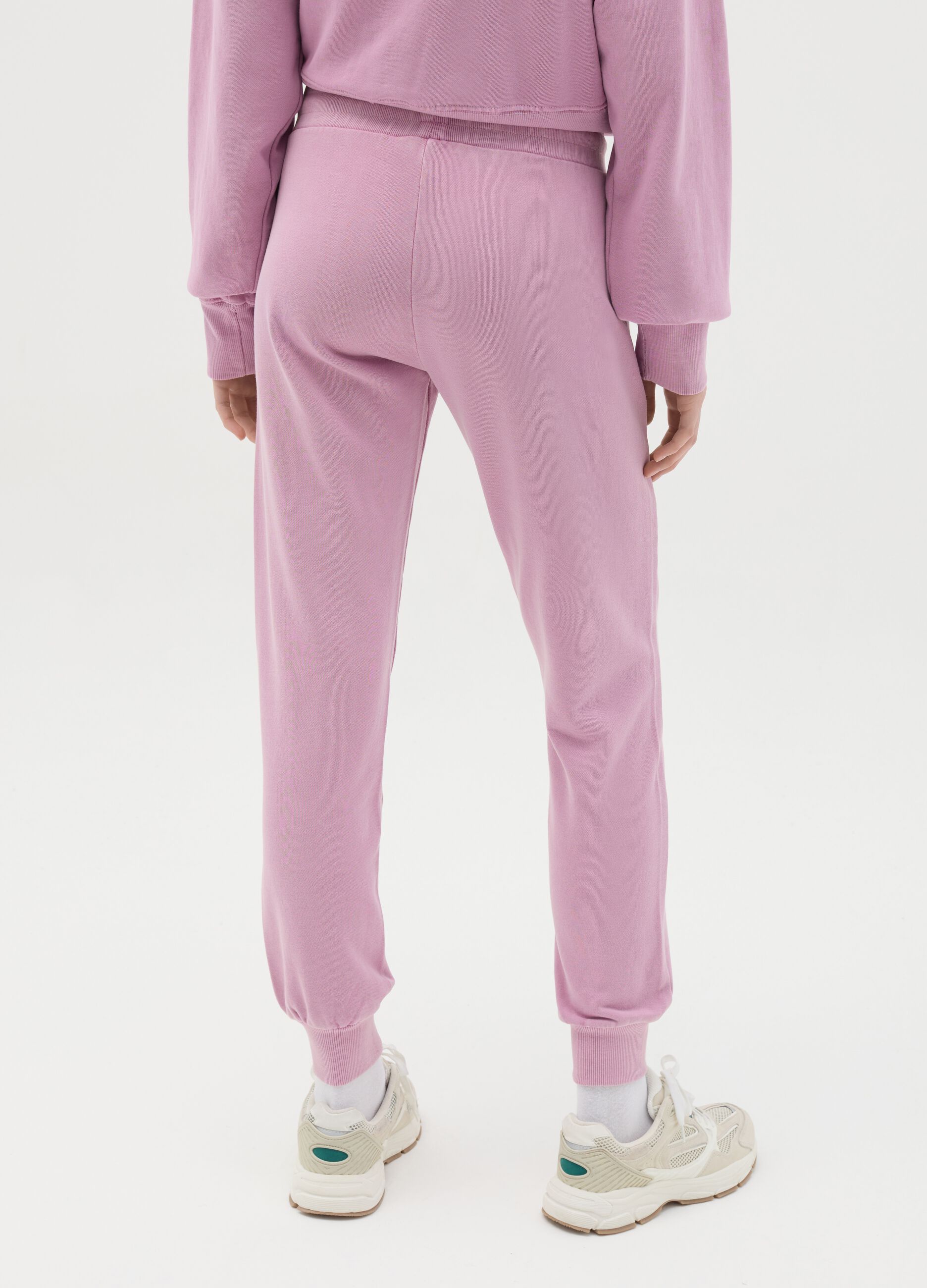 Pink joggers with elasticated edging and logo print