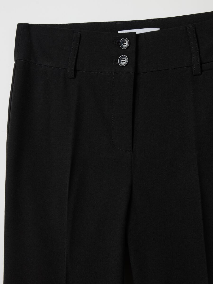 Flare-fit trousers with double button_5