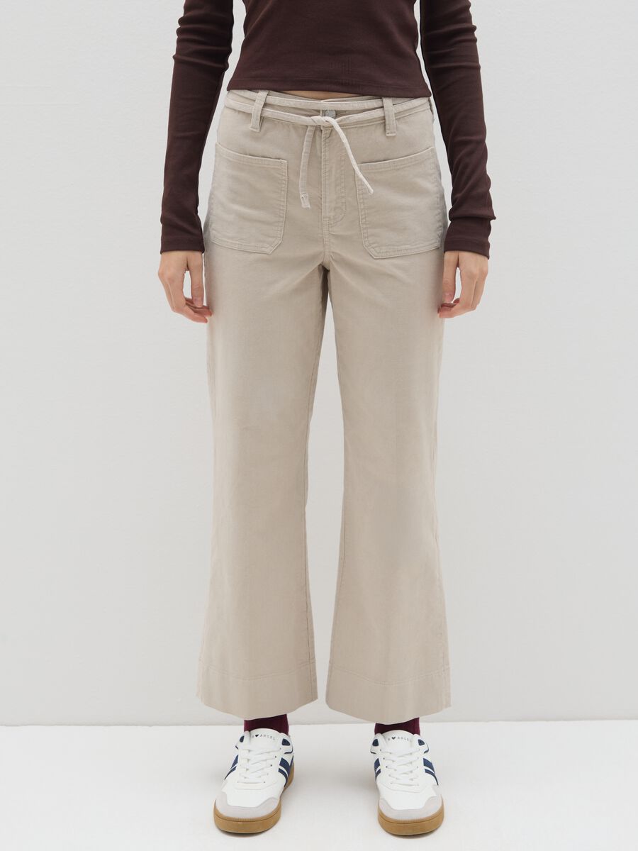 Beige flared corduroy trousers_1