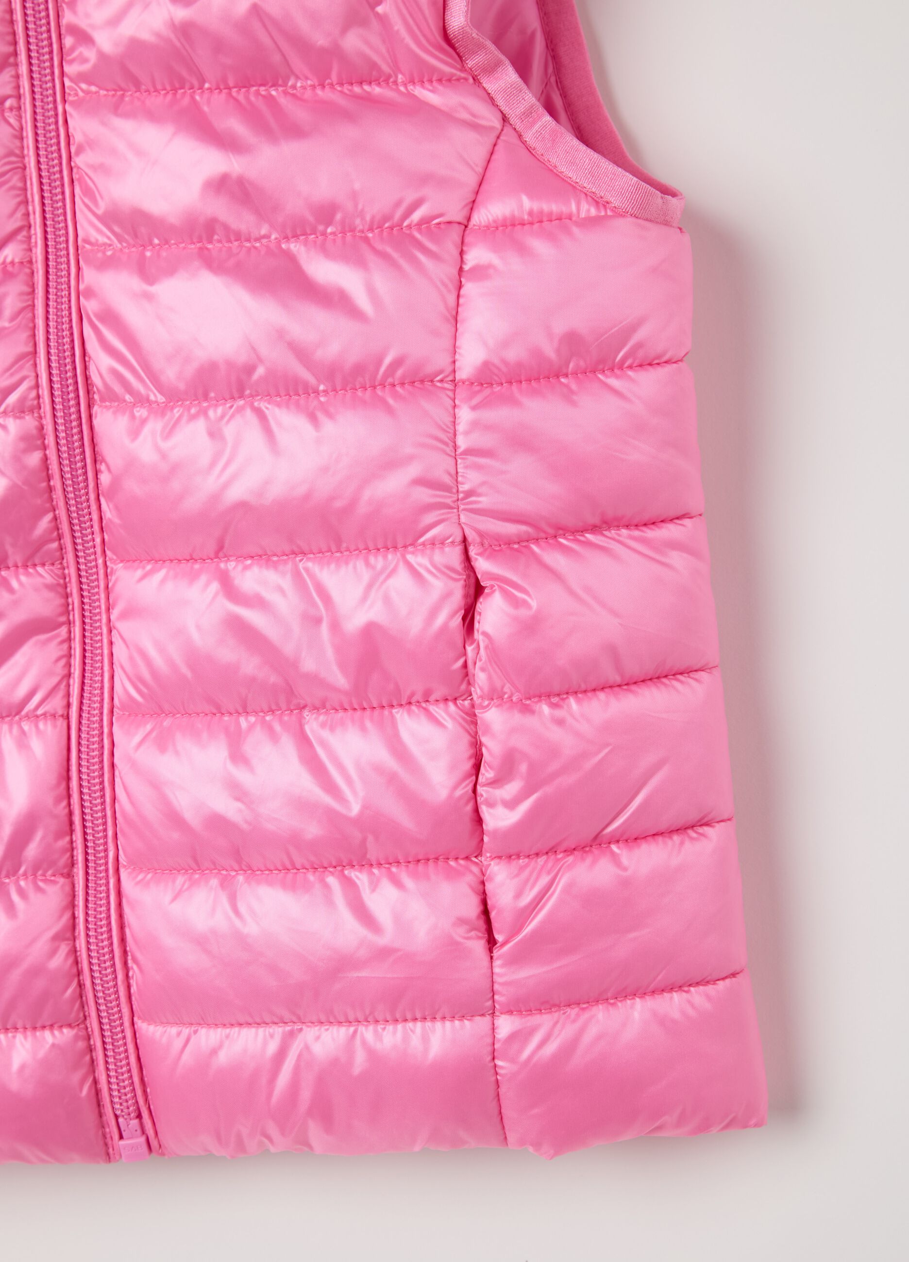 Pink gilet with hood and unicorn