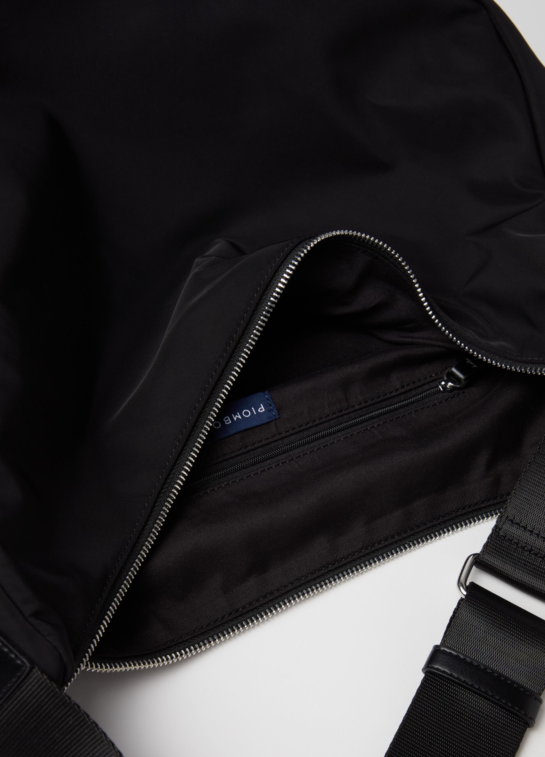 Contemporary half-moon bag with shoulder strap
