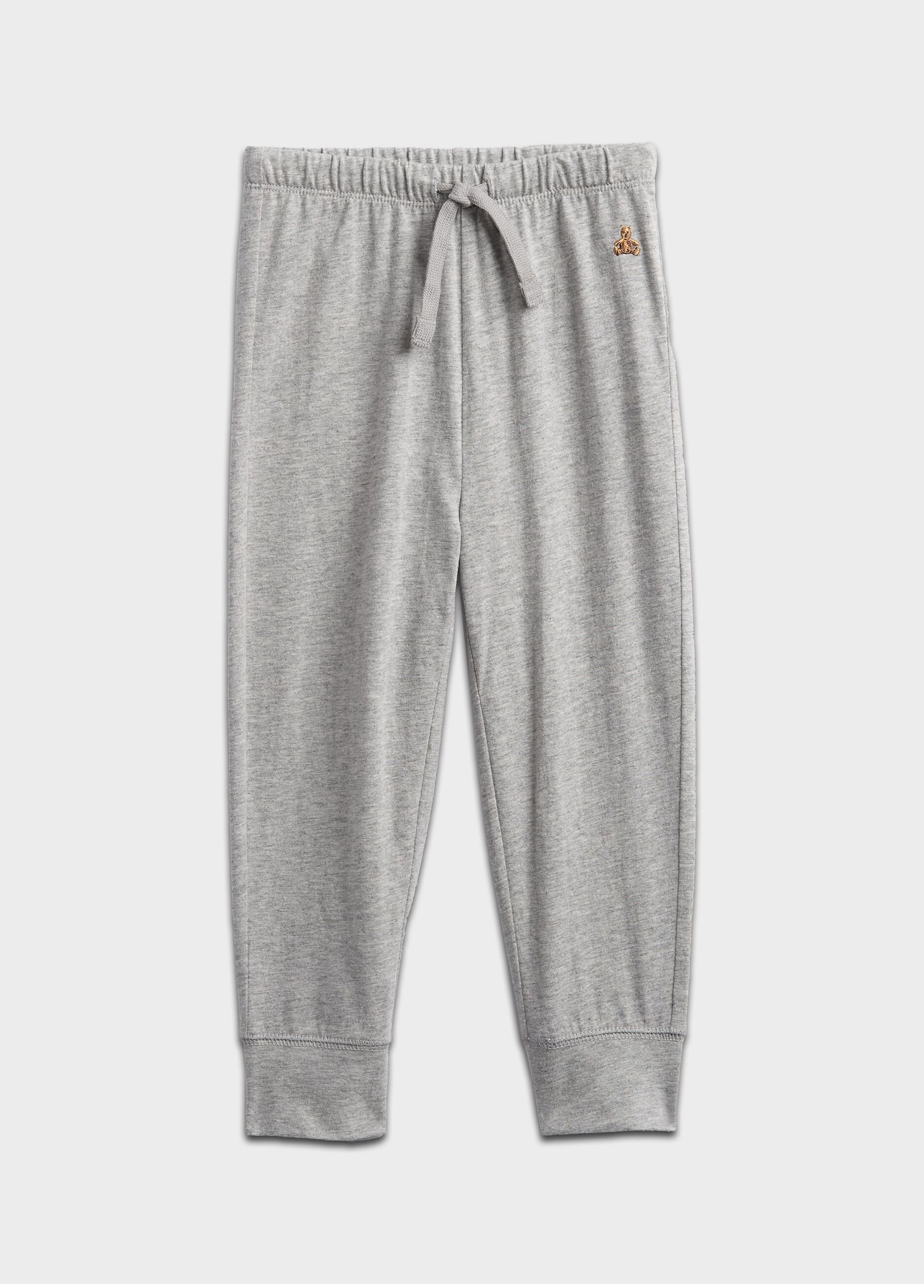 Joggers with drawstring and teddy bear embroidery