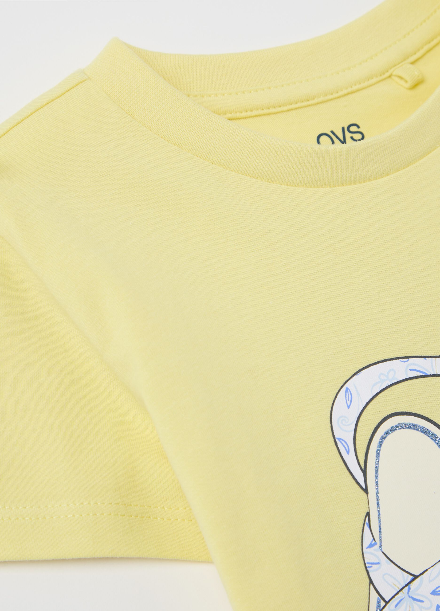 Yellow T-shirt in cotton with glitter print