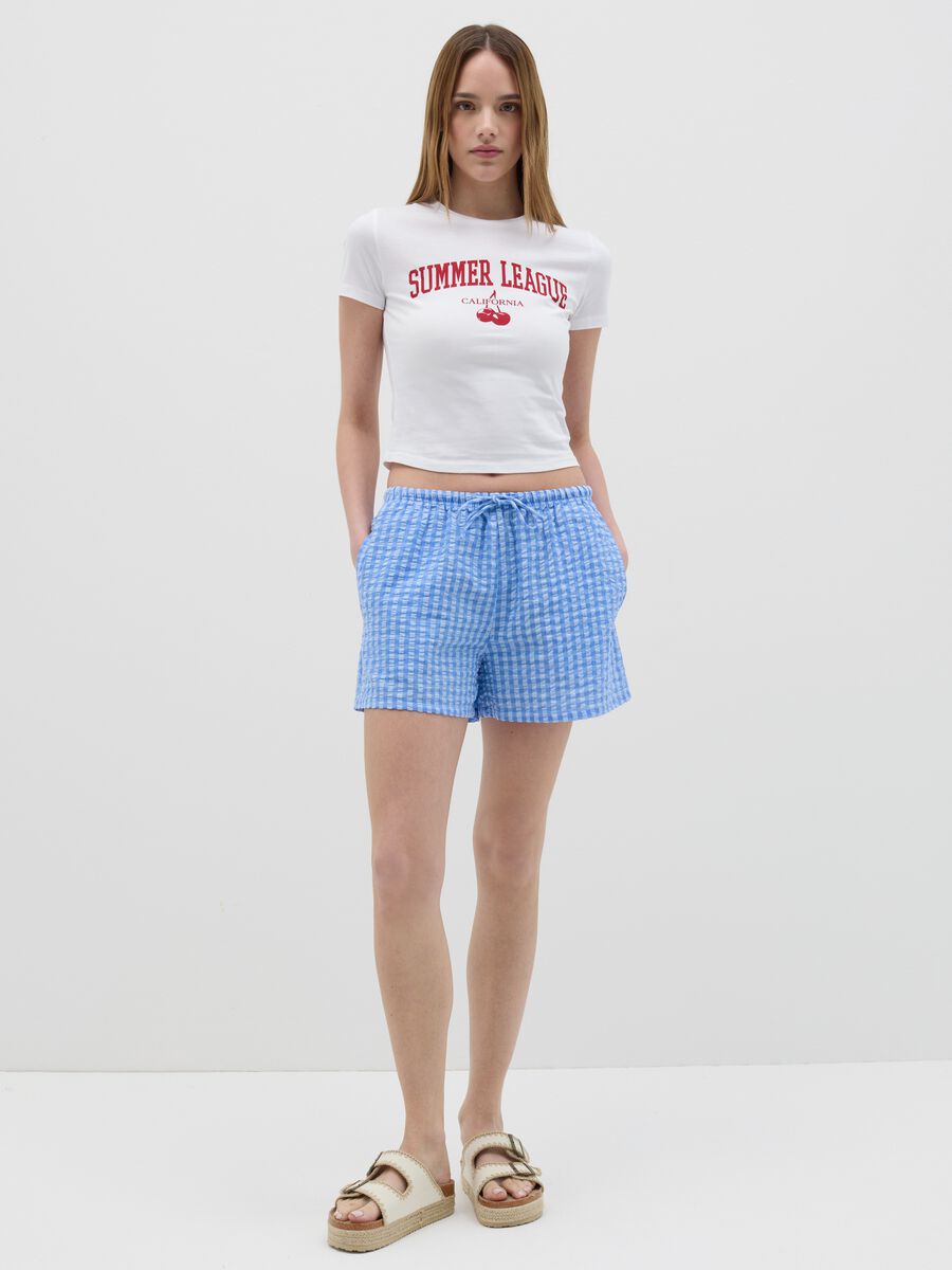 Light blue shorts in striped cotton_0