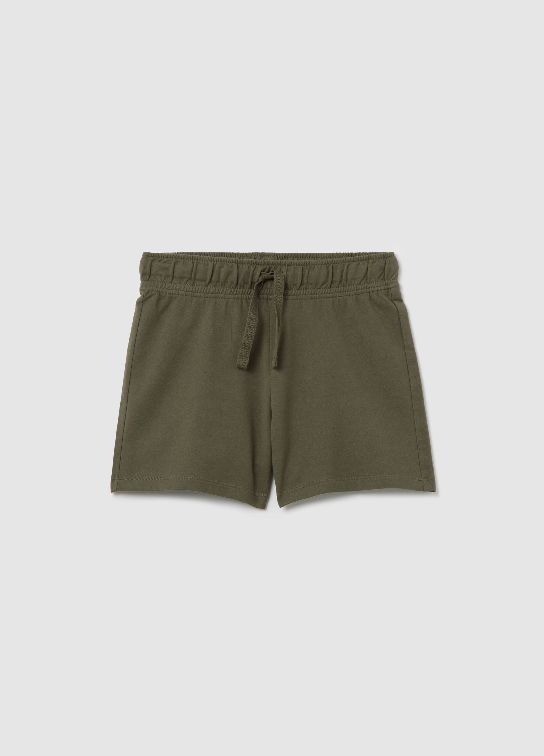 Green shorts in cotton with drawstring