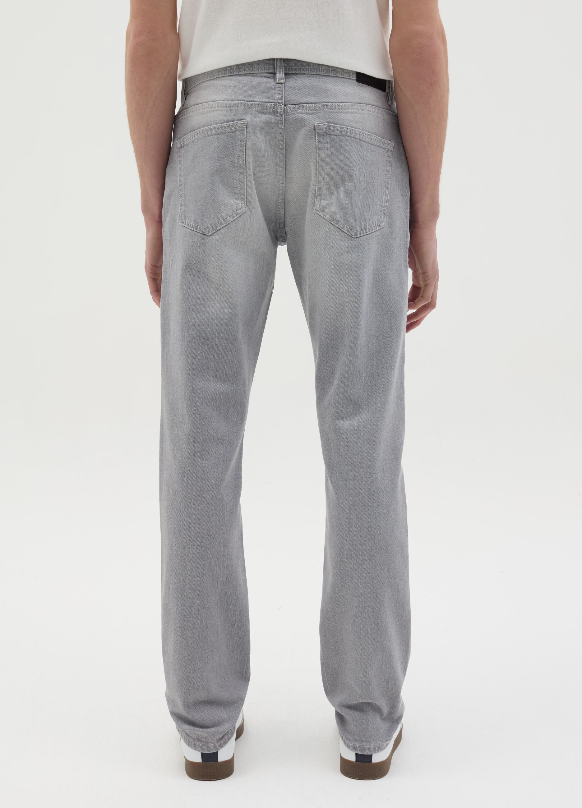 Jeans slim fit con scoloriture