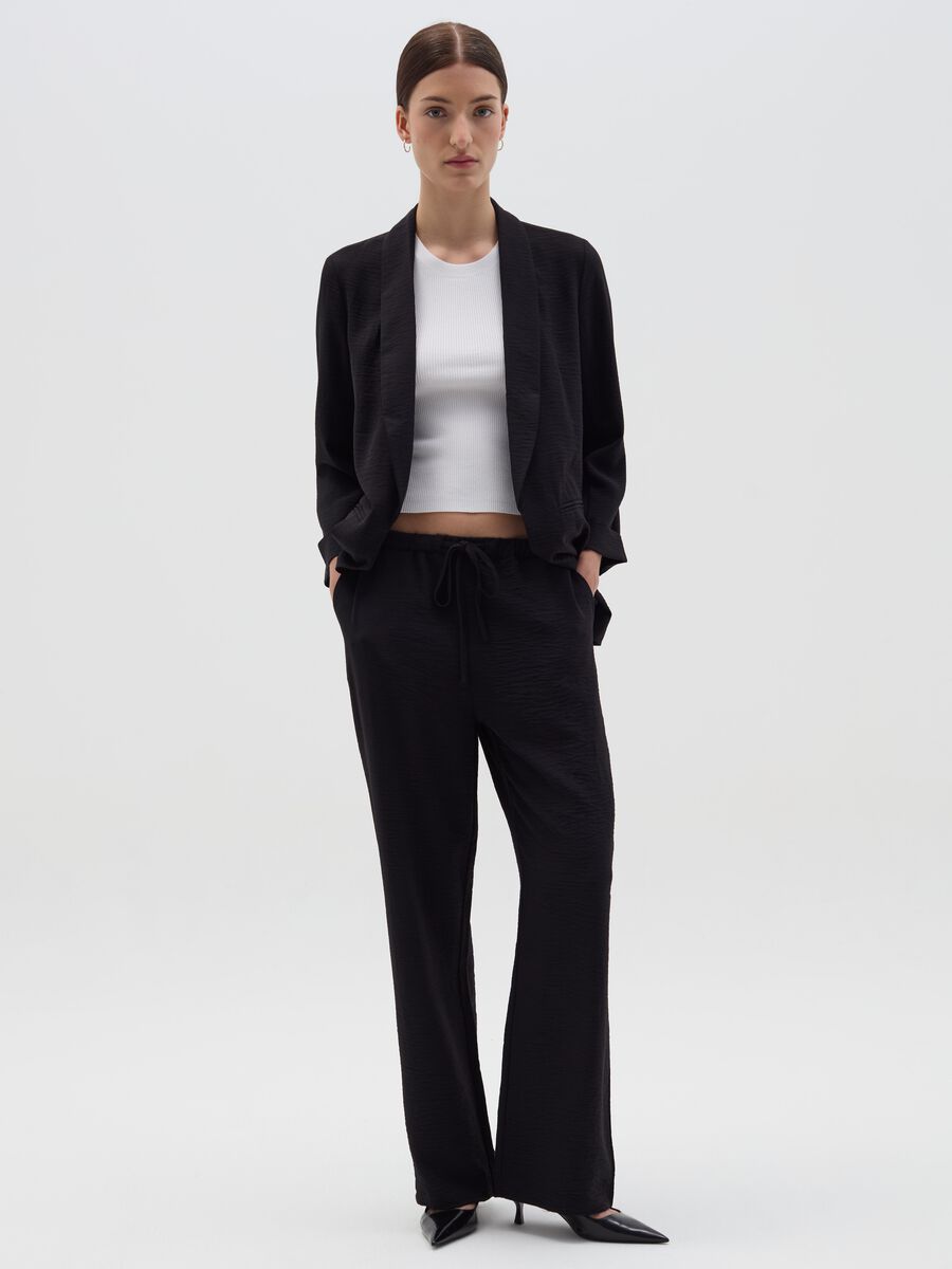 Crinkle-effect fluid trousers_0