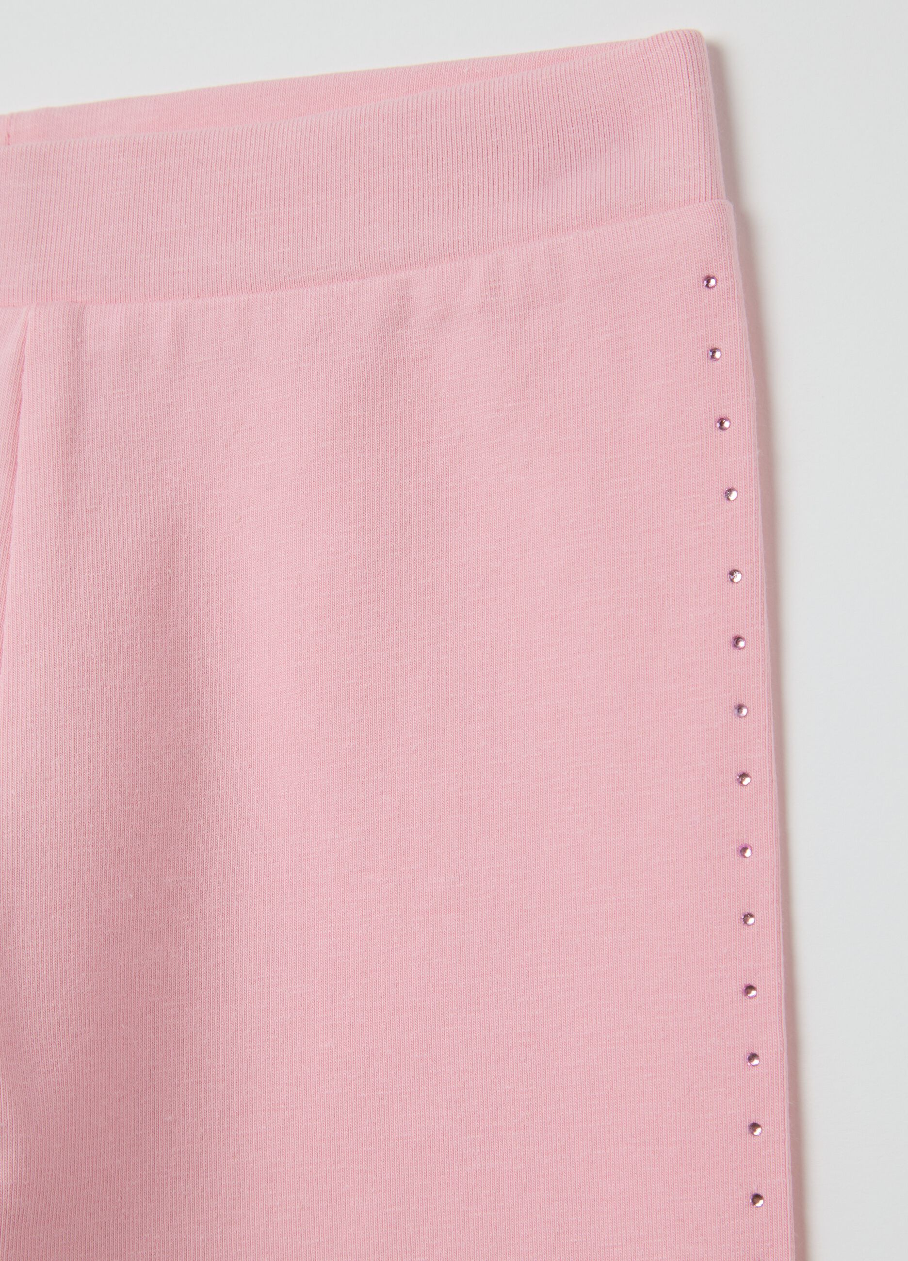Leggings rosa a tre quarti in cotone stretch con strass