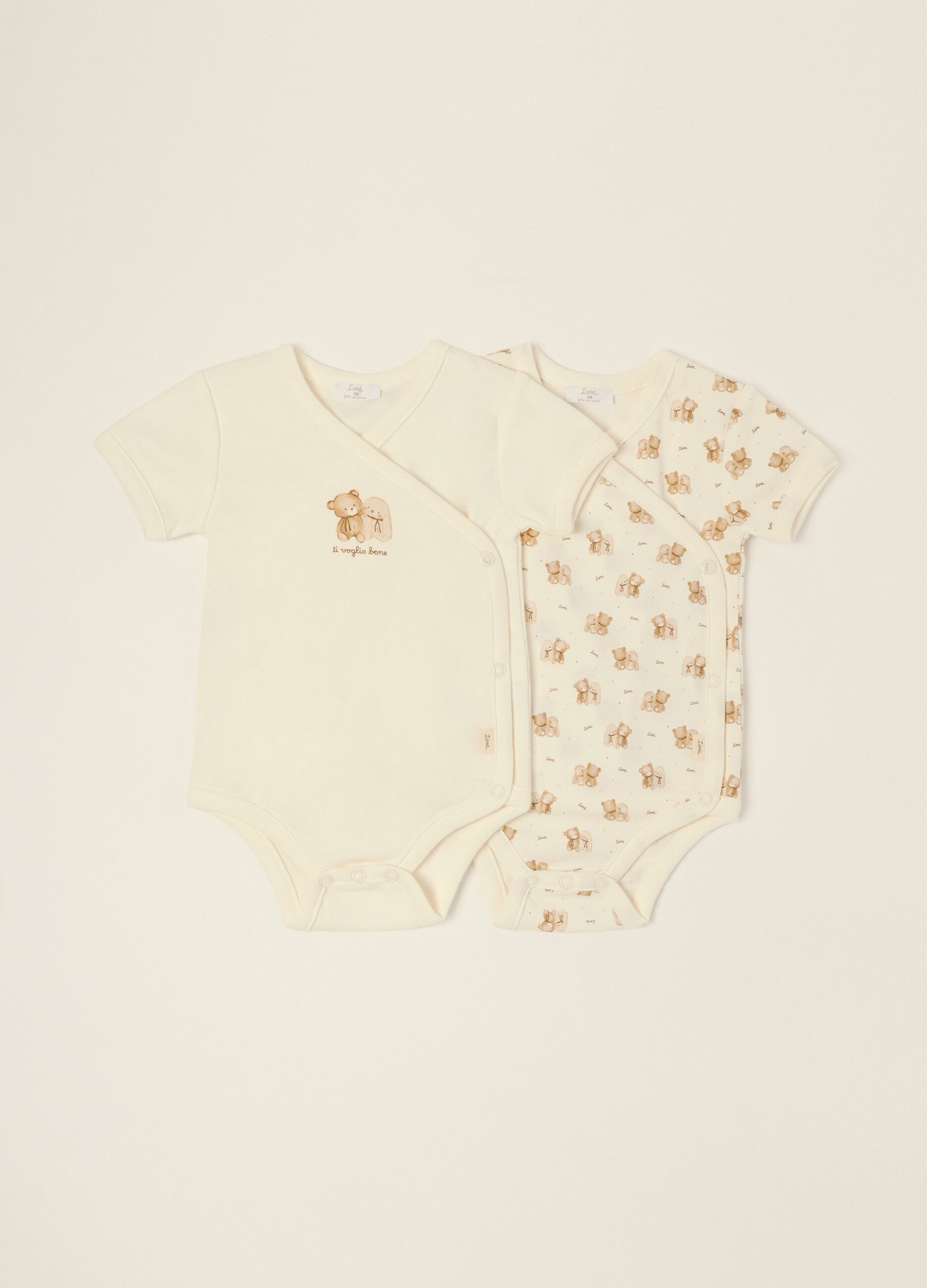 Two-pack of white pure cotton baby bodysuits with teddy bear print