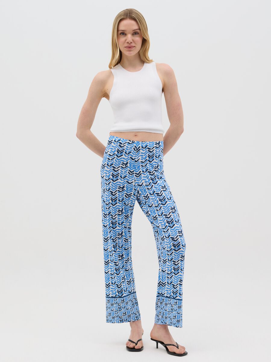 Blue jersey trousers with geometric pattern_0