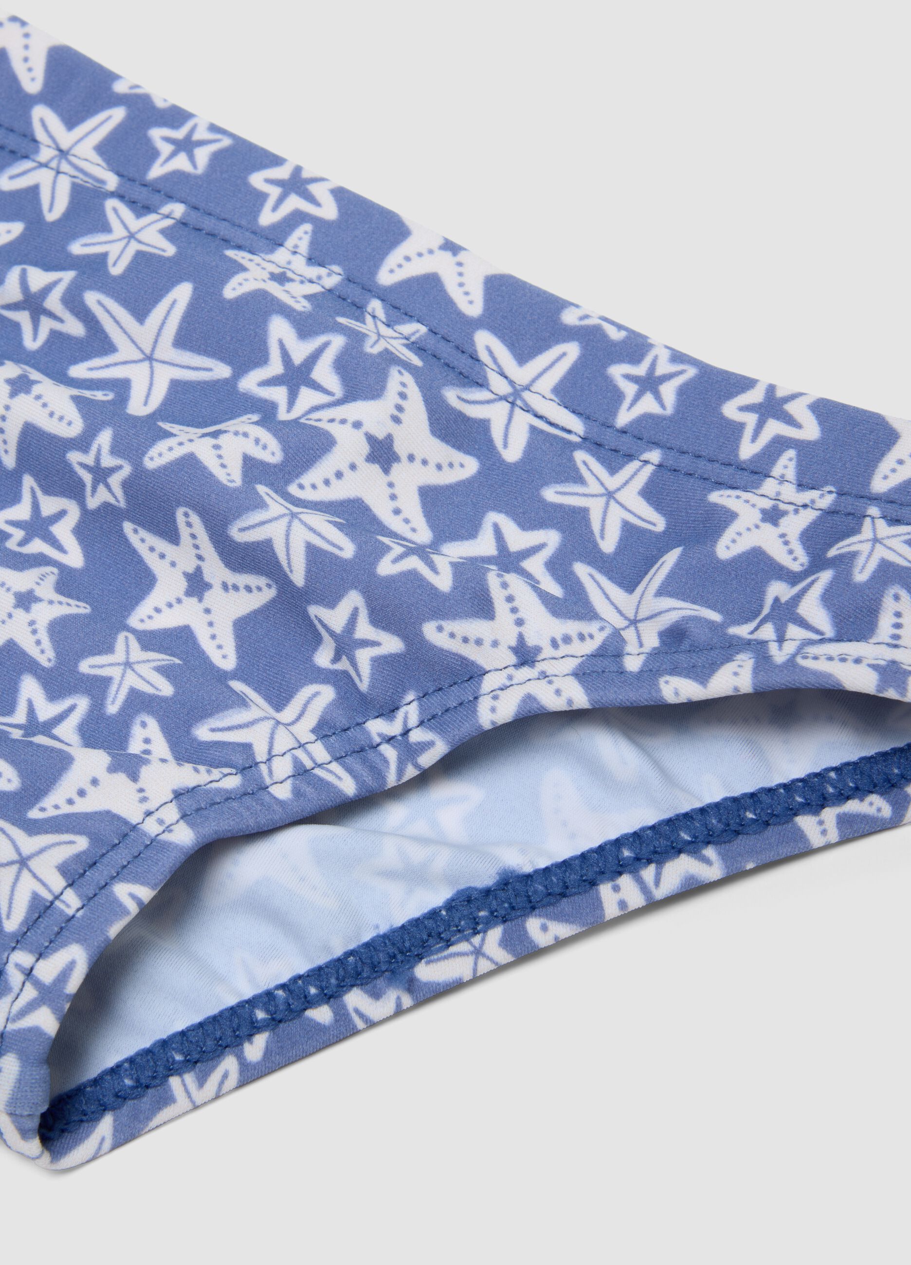 Blue stretch swim briefs with starfish print