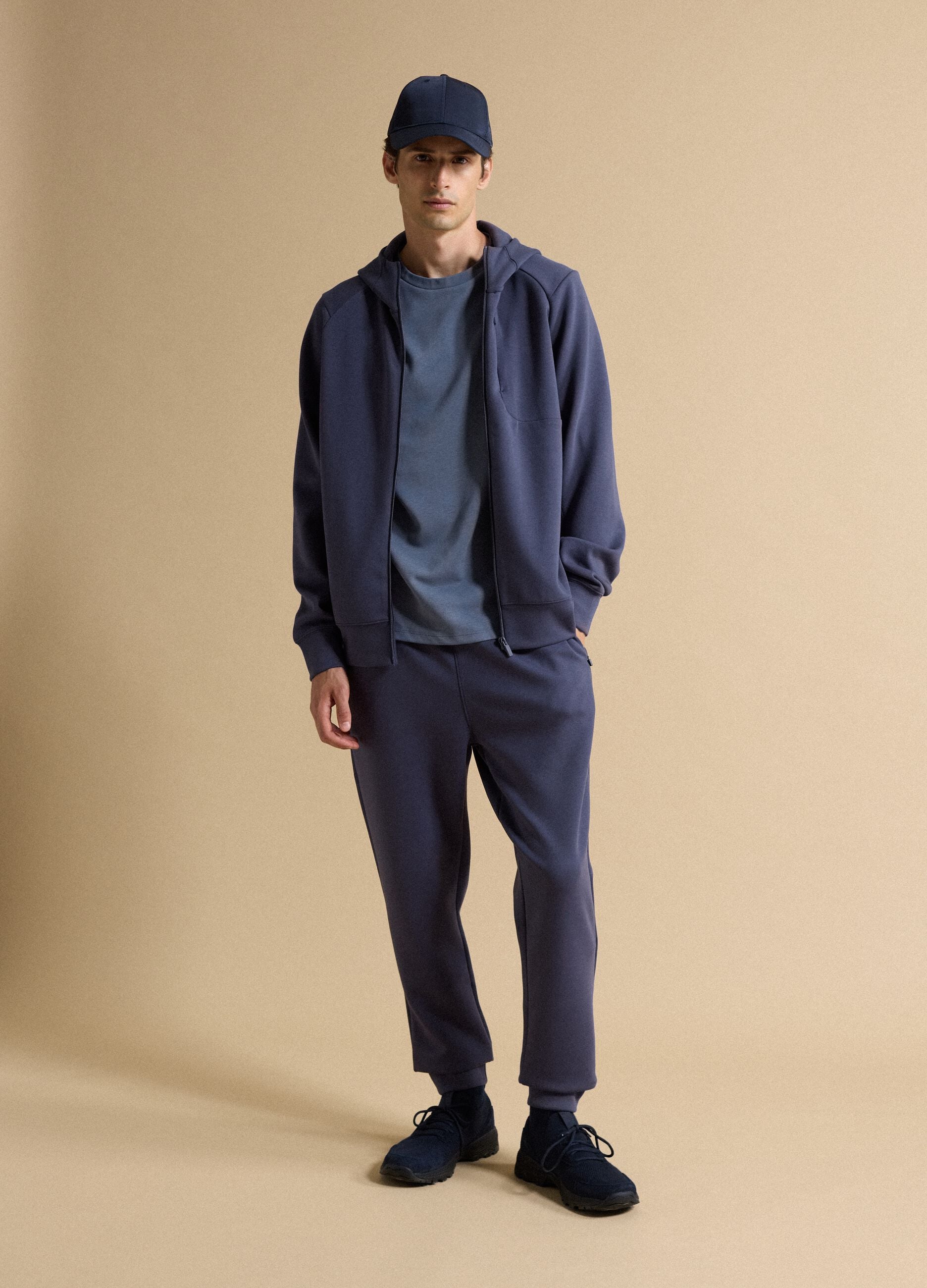 Blue cap with curved peak