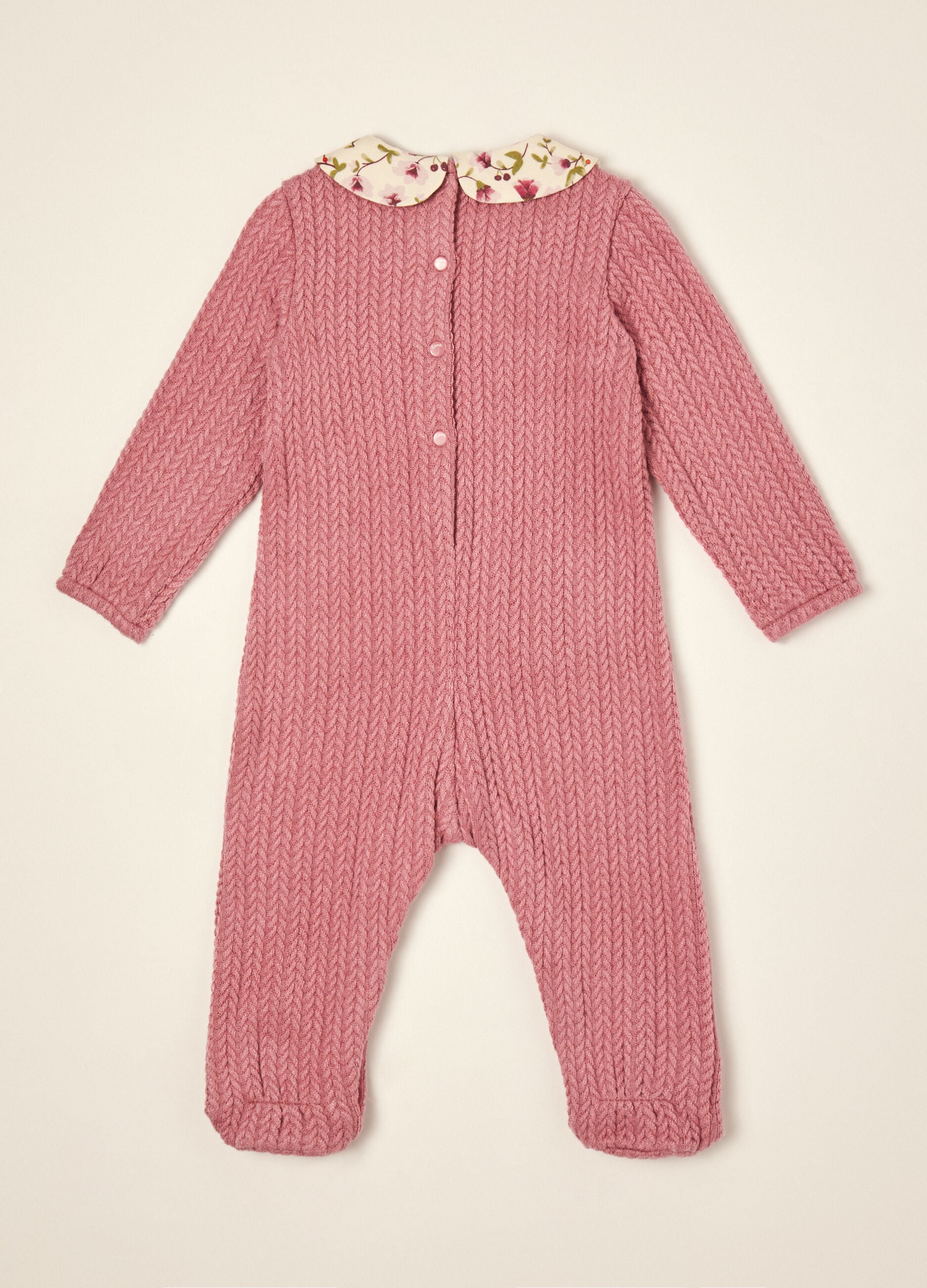 Pink stretch viscose baby sleepsuit with floral collar