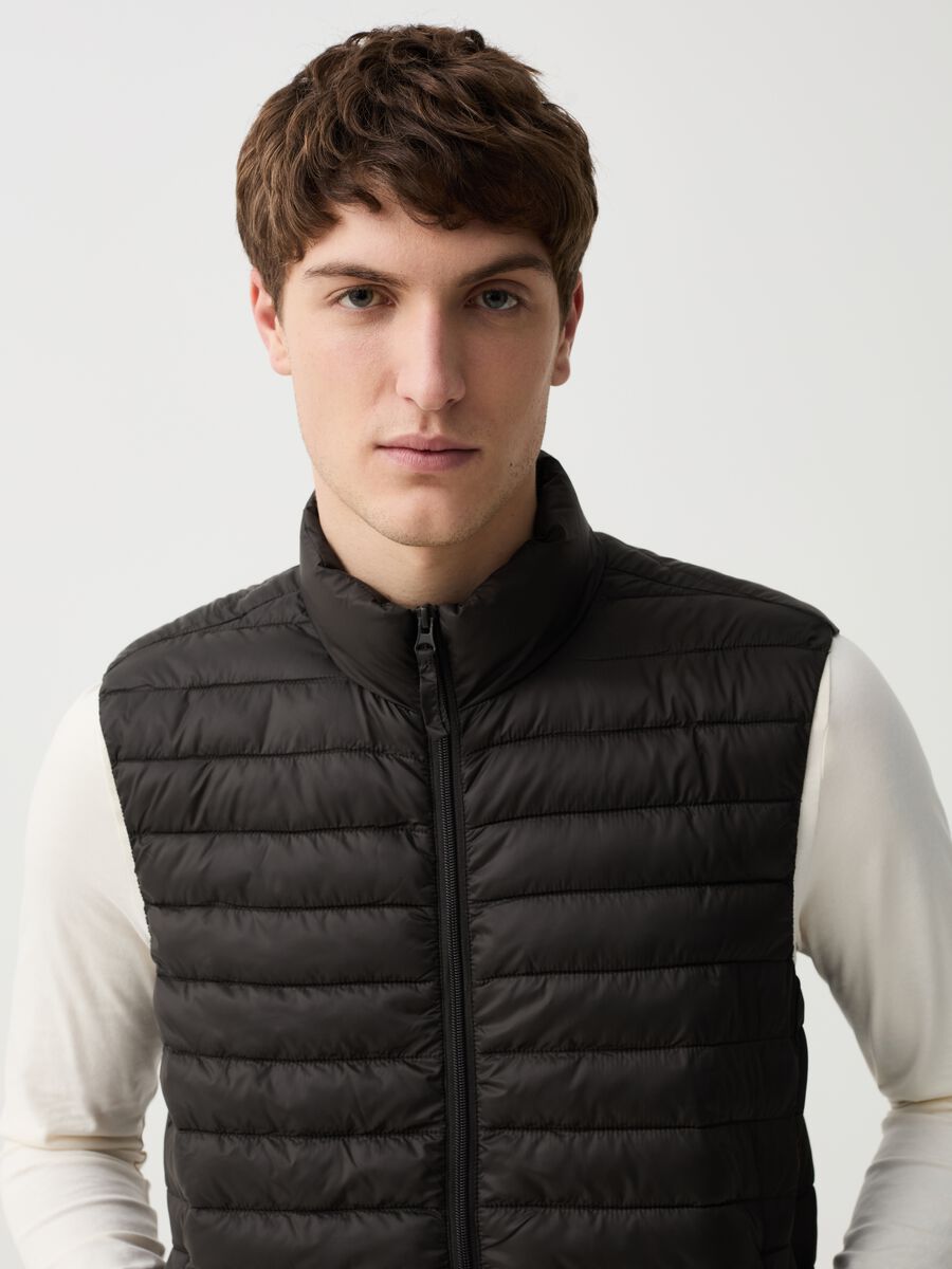 Ultralight quilted gilet with high neck_1