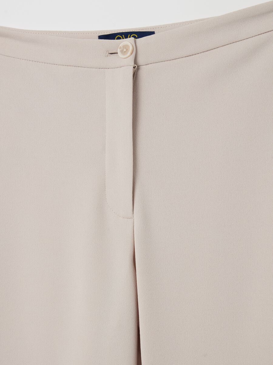 Solid colour flare-fit trousers_5
