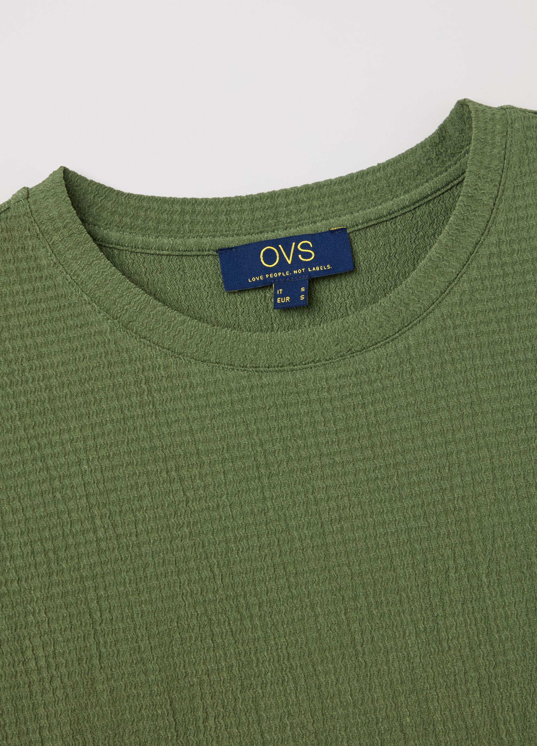 Green short-sleeved T-shirt with waffle weave