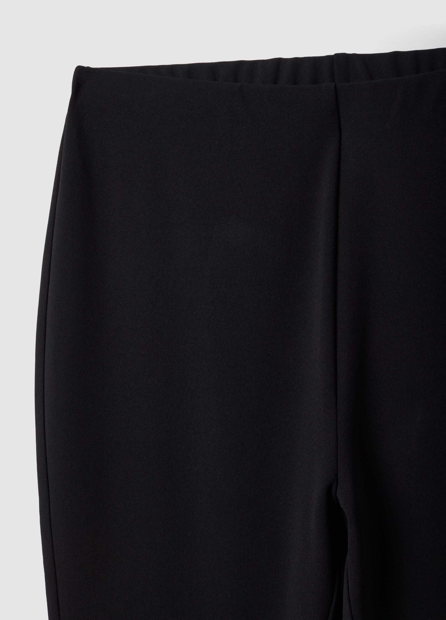 Black flared leggings in stretch fabric
