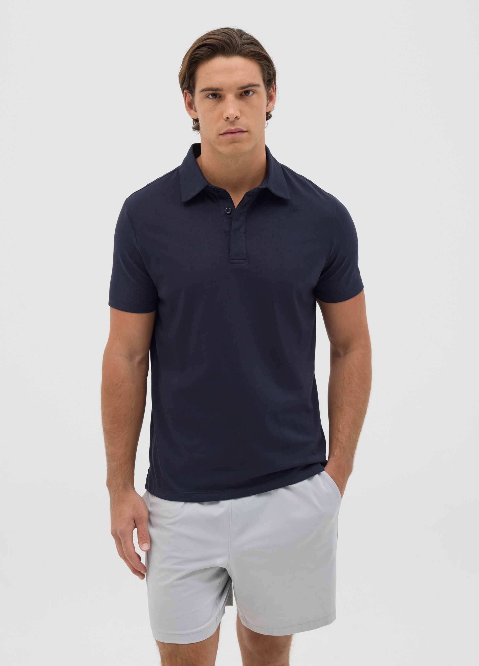 Polo blu in tessuto tecnico 