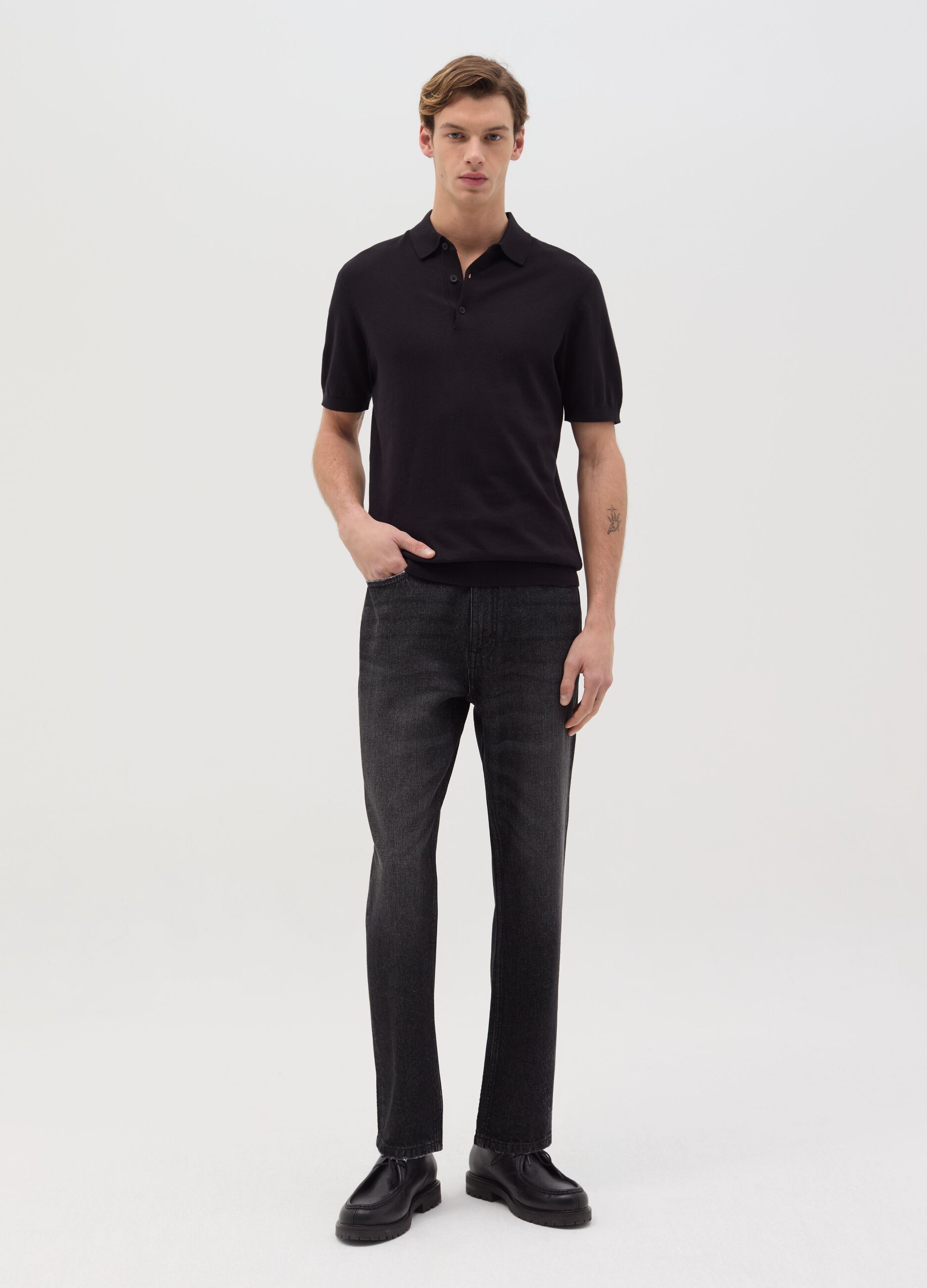 Jeans carrot fit con scoloriture