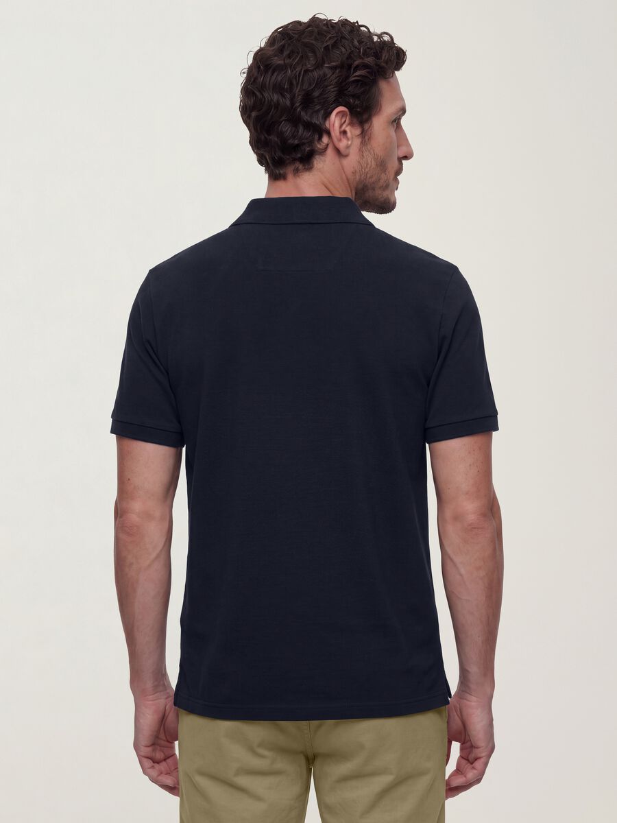 Polo nera in puro cotone piquet con colletto classico regular fit_1