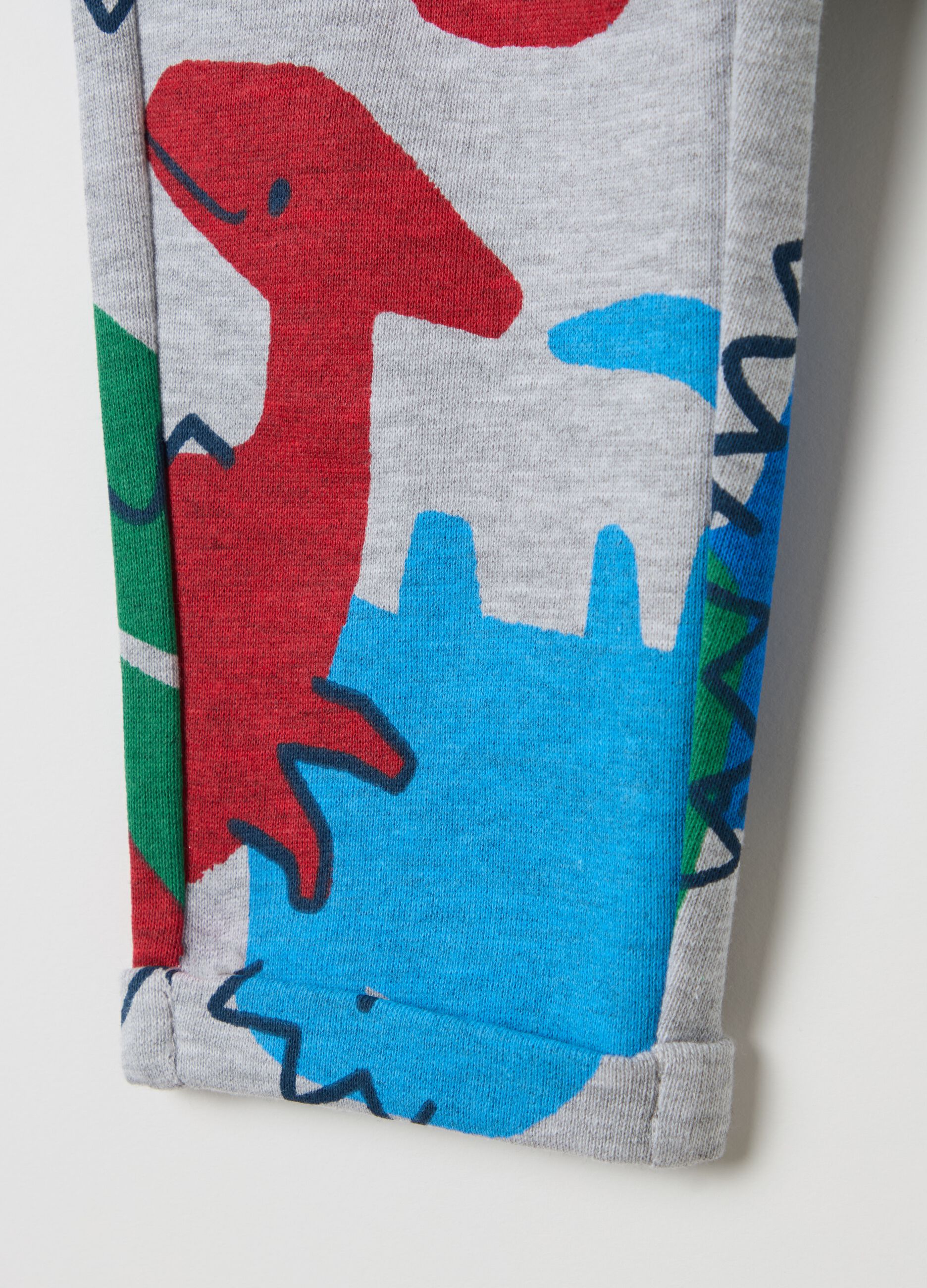 Joggers with all-over dinosaurs print
