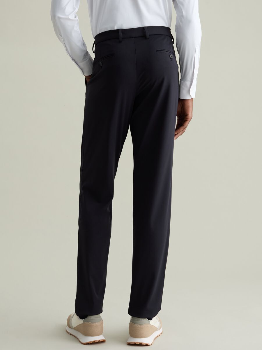 Chino trousers in technical fabric_3