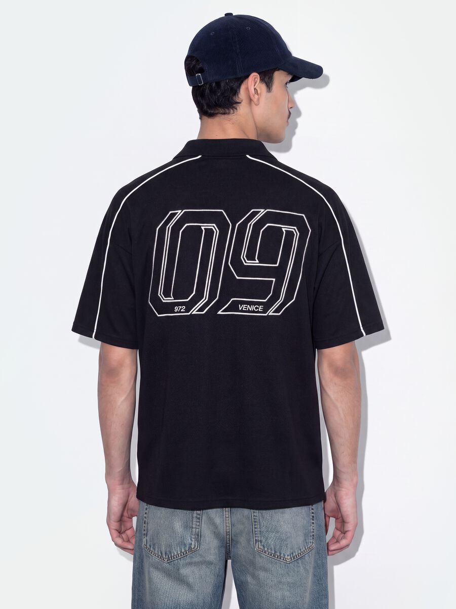 Polo nera in puro cotone over fit a maniche corte over fit_2