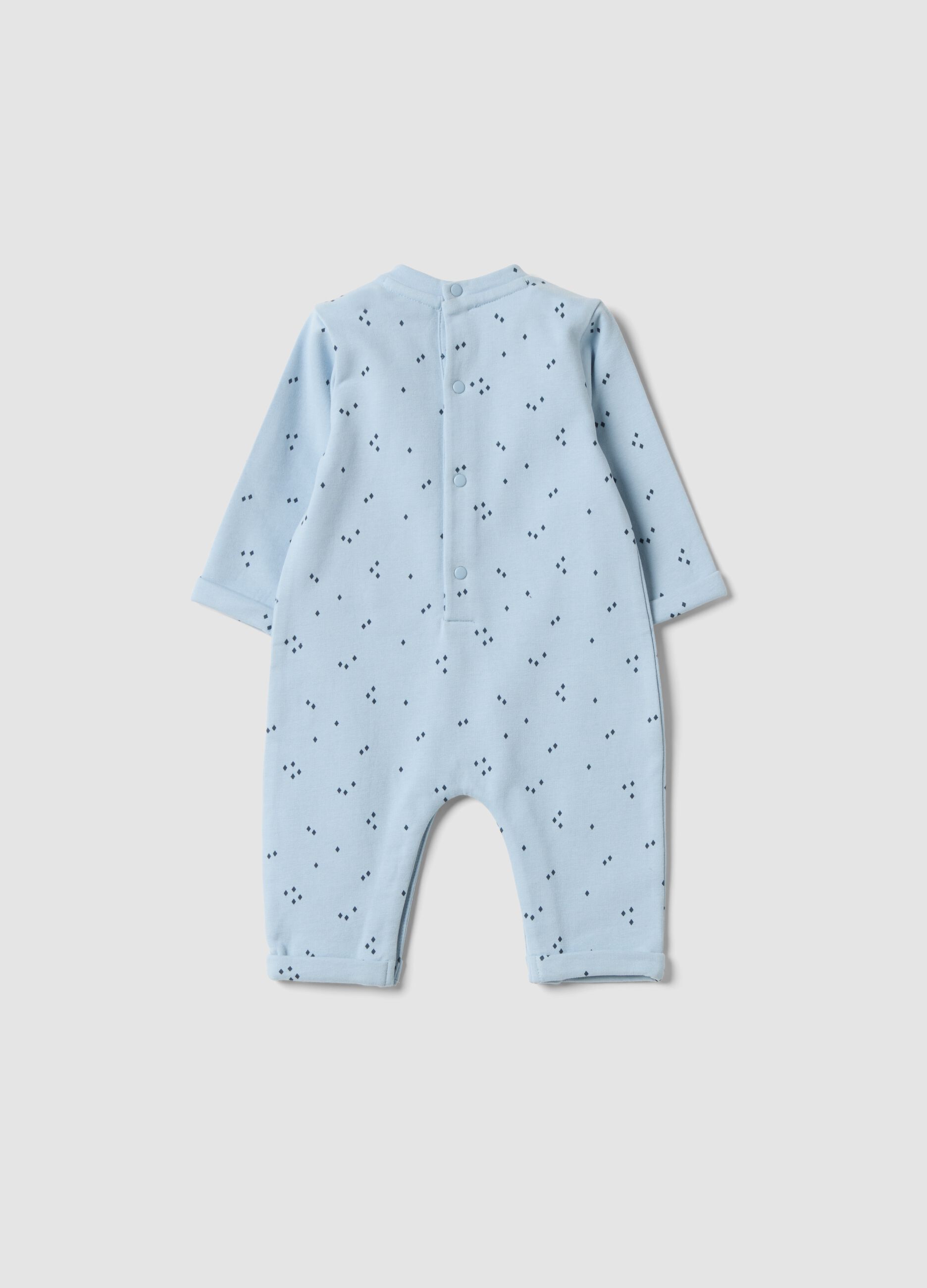 Tutina azzurra in puro cotone organico con stampa all over