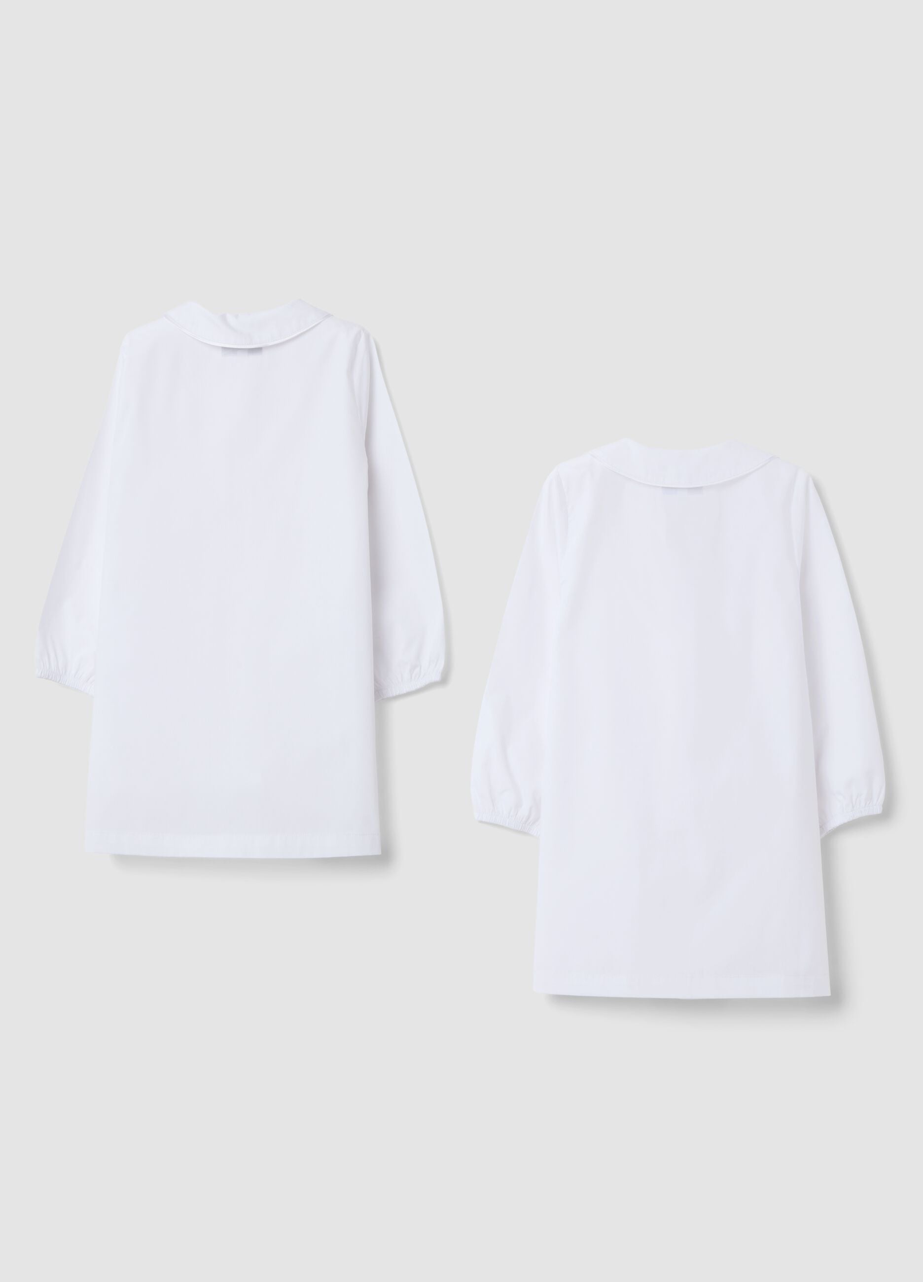 2-pack of white nursery school aprons with classic collar