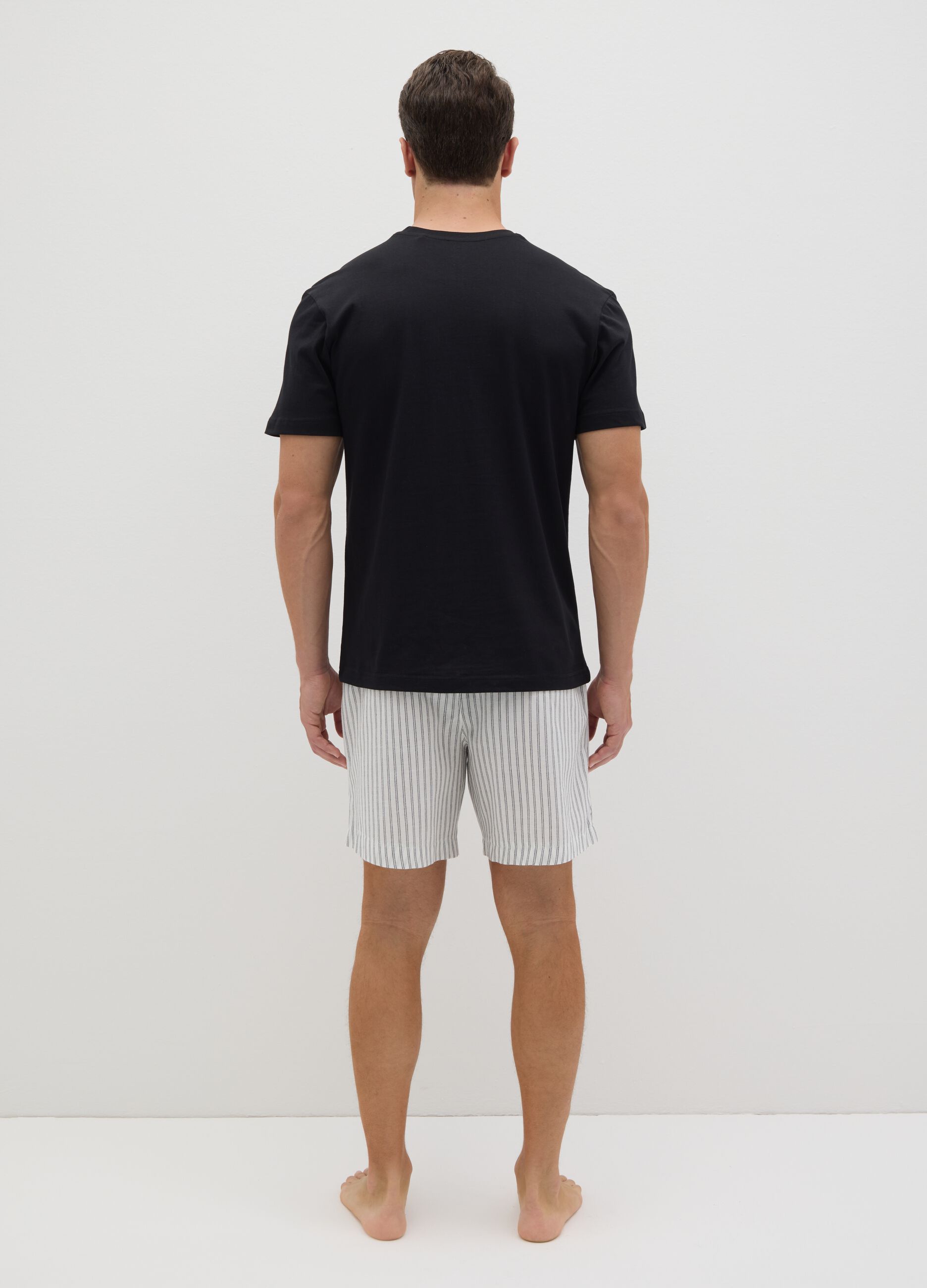 Men's pyjamas in pure black cotton, regular fit with checked shorts