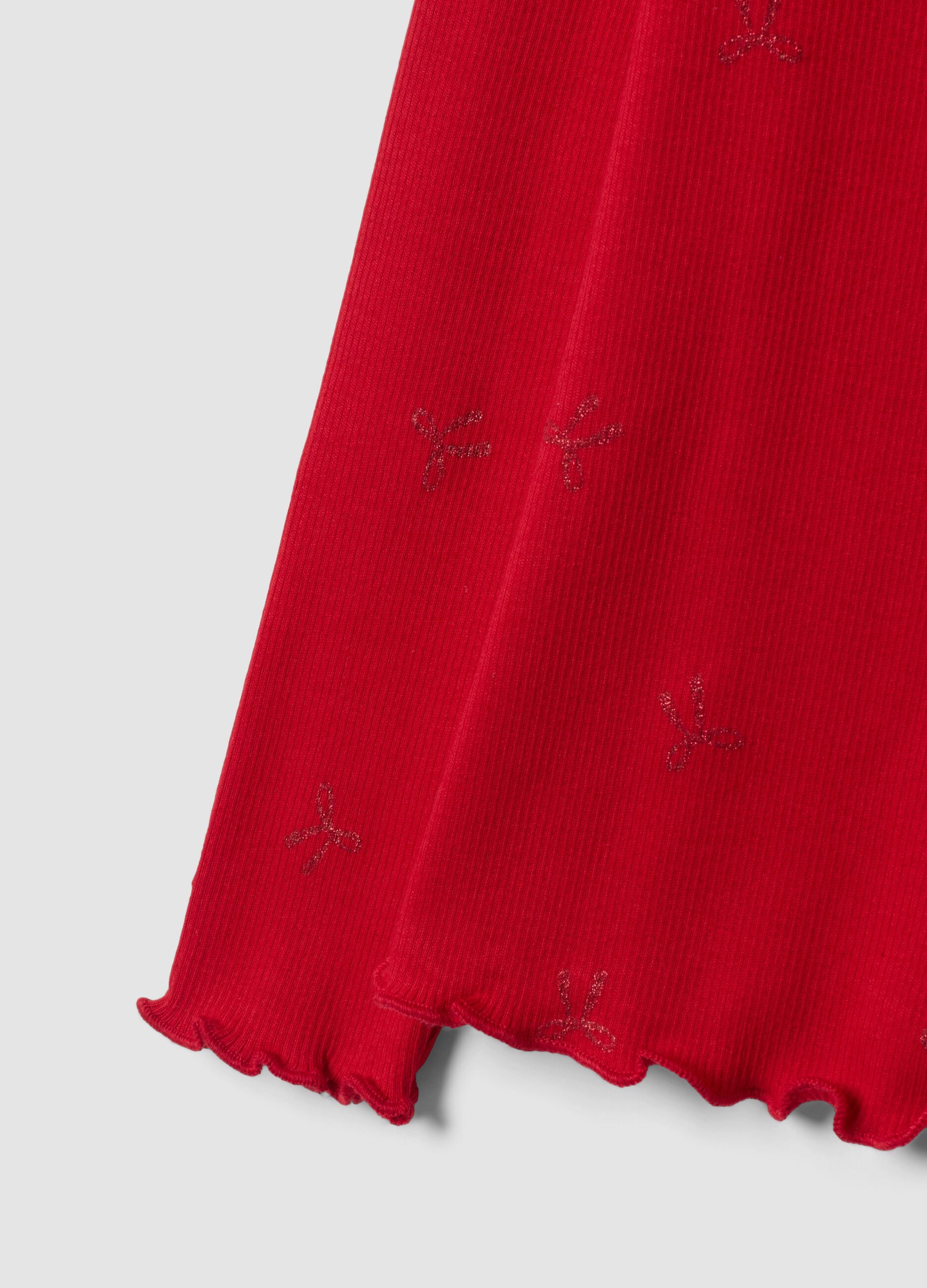 Maglia rossa in cotone elasticizzato con fiocchi glitter