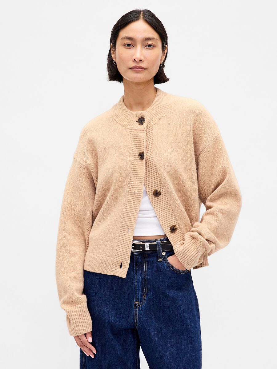 Beige knitted cardigan for women_0