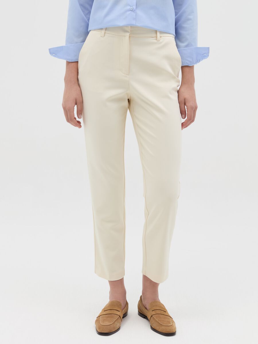 Chino trousers with pockets_1