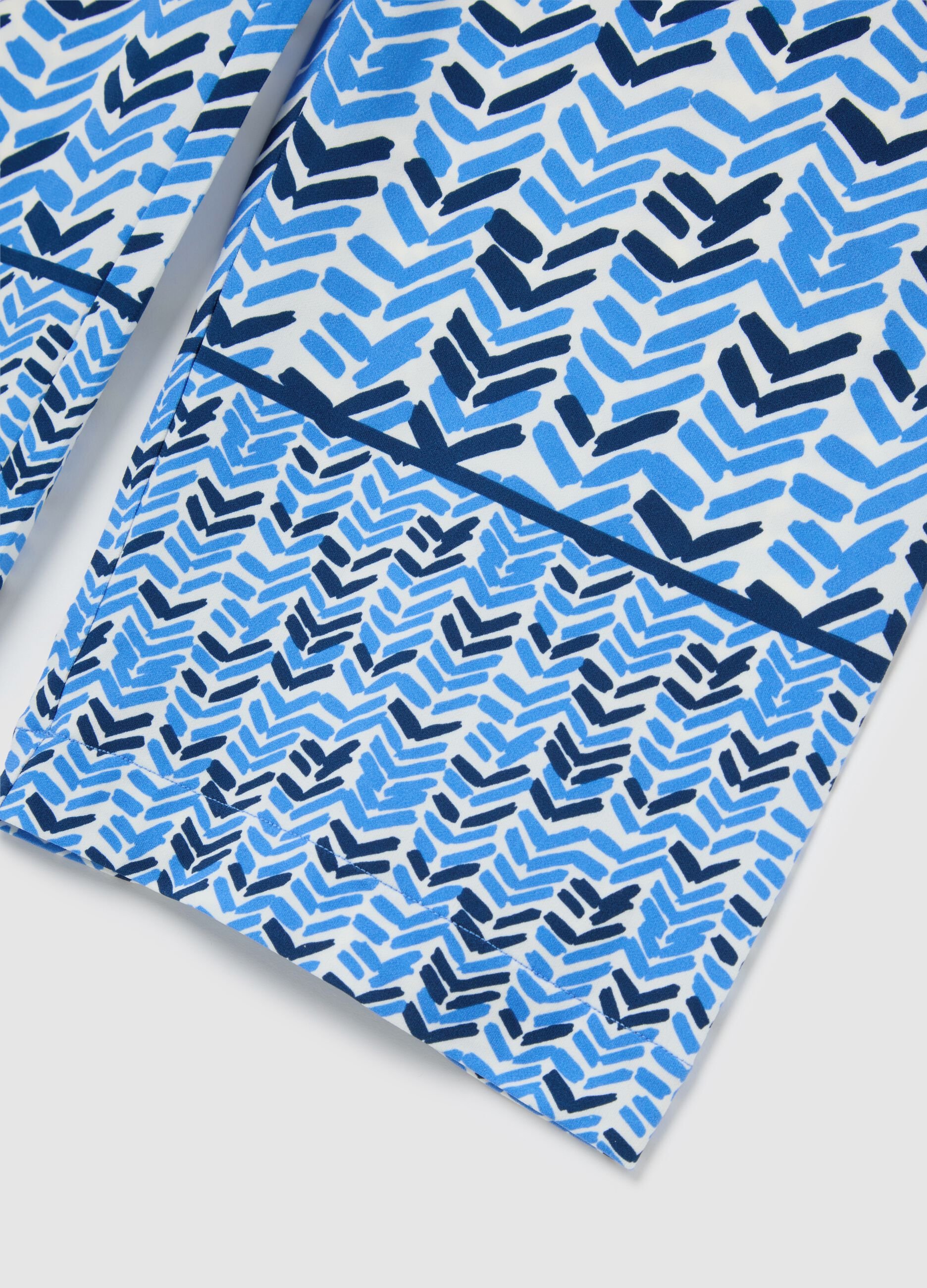 Blue jersey trousers with geometric pattern