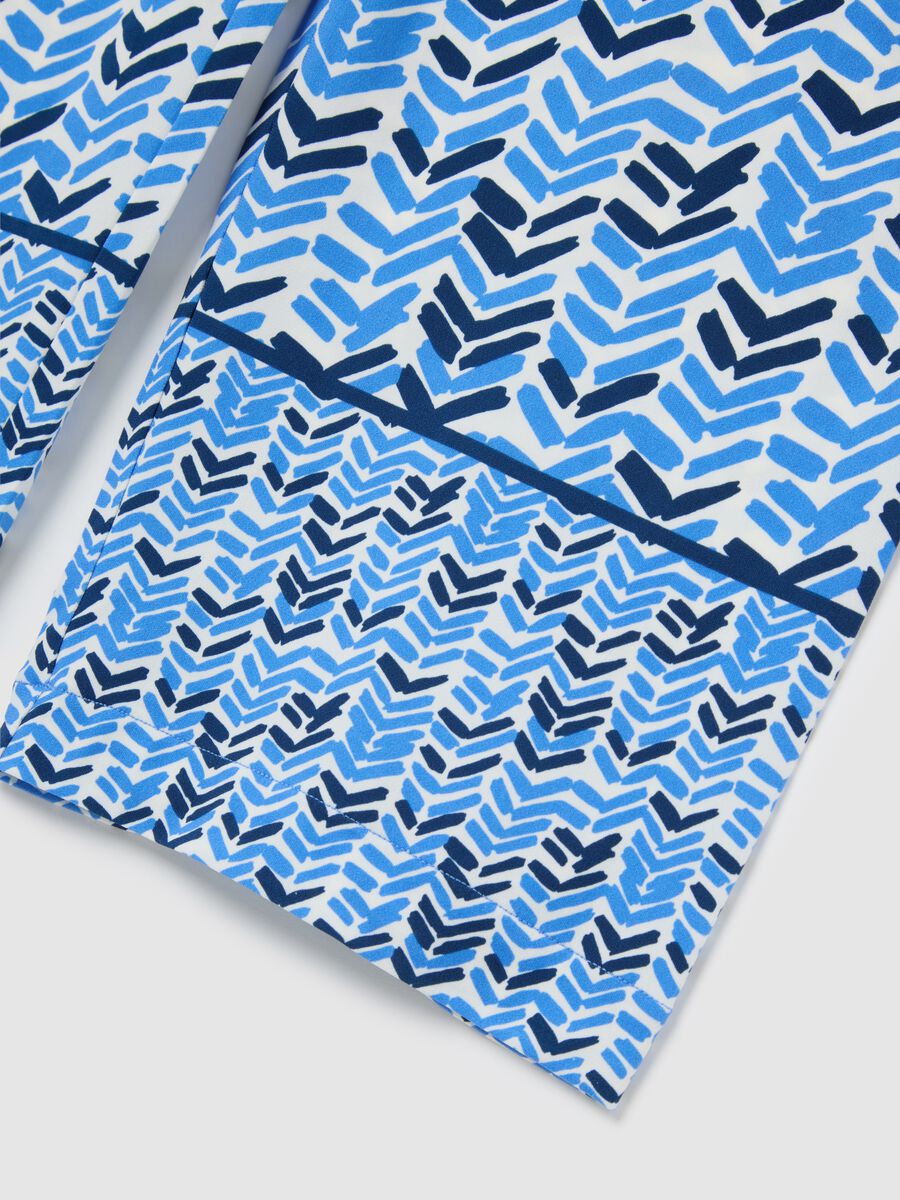 Blue jersey trousers with geometric pattern_5