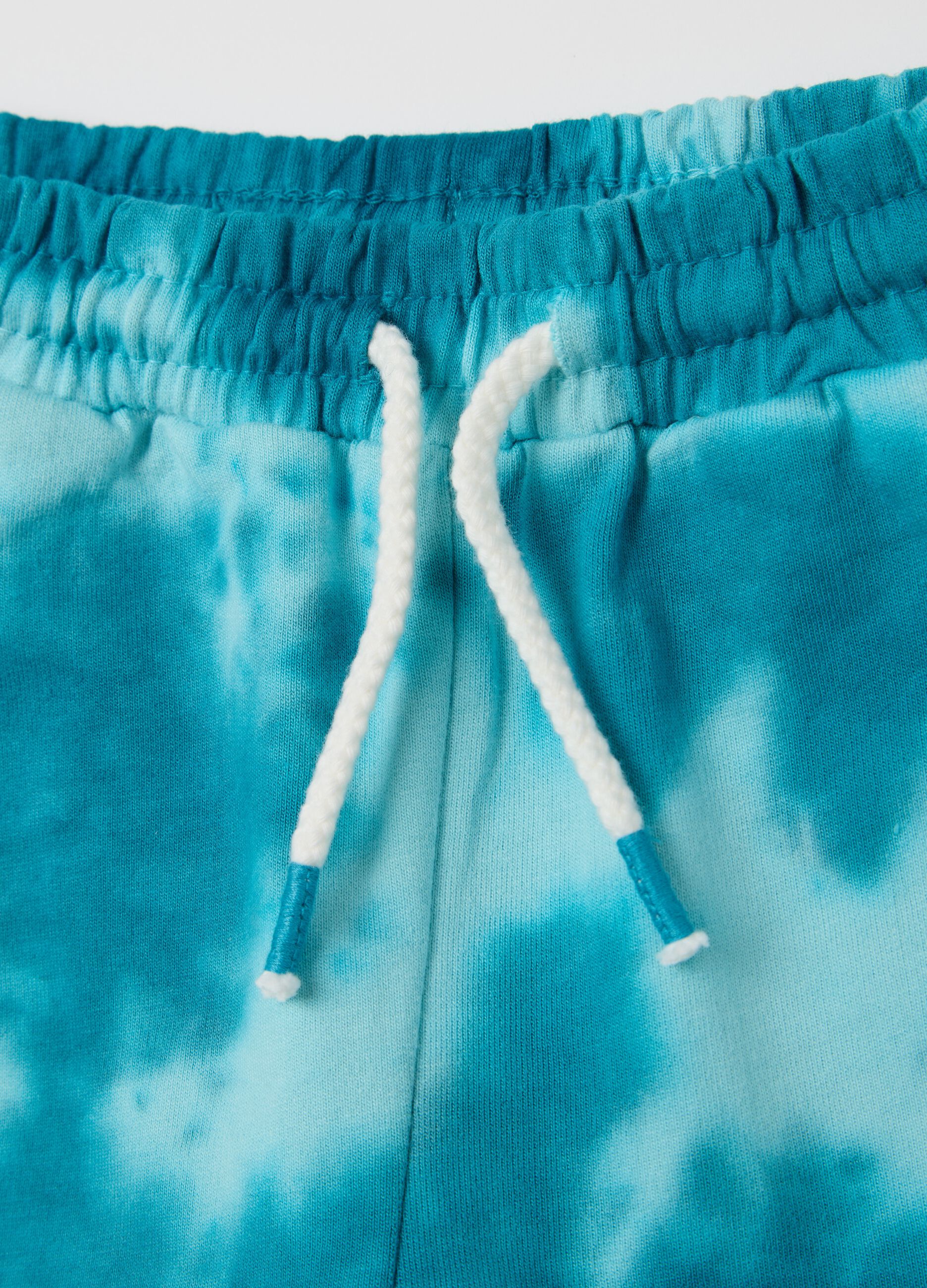 Light blue Bermuda joggers in tie-dye cotton with drawstring