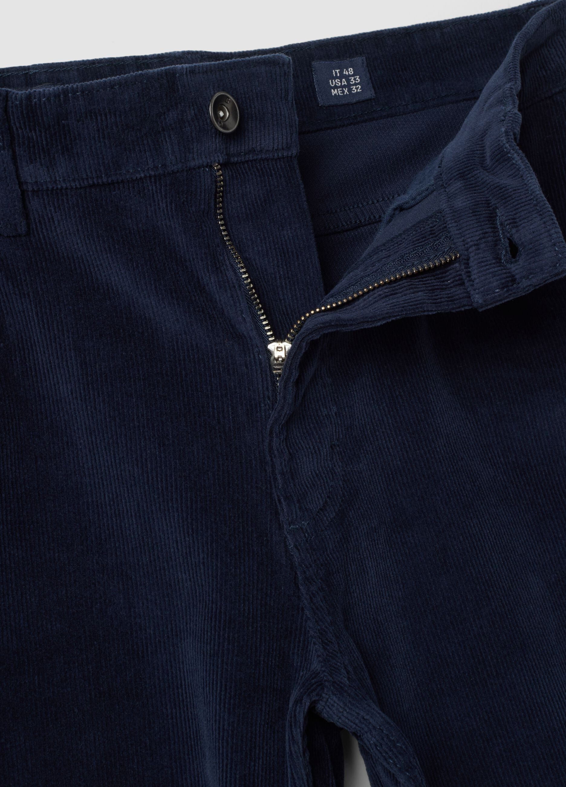 Pantaloni blu in cotone elasticizzato a coste regular fit