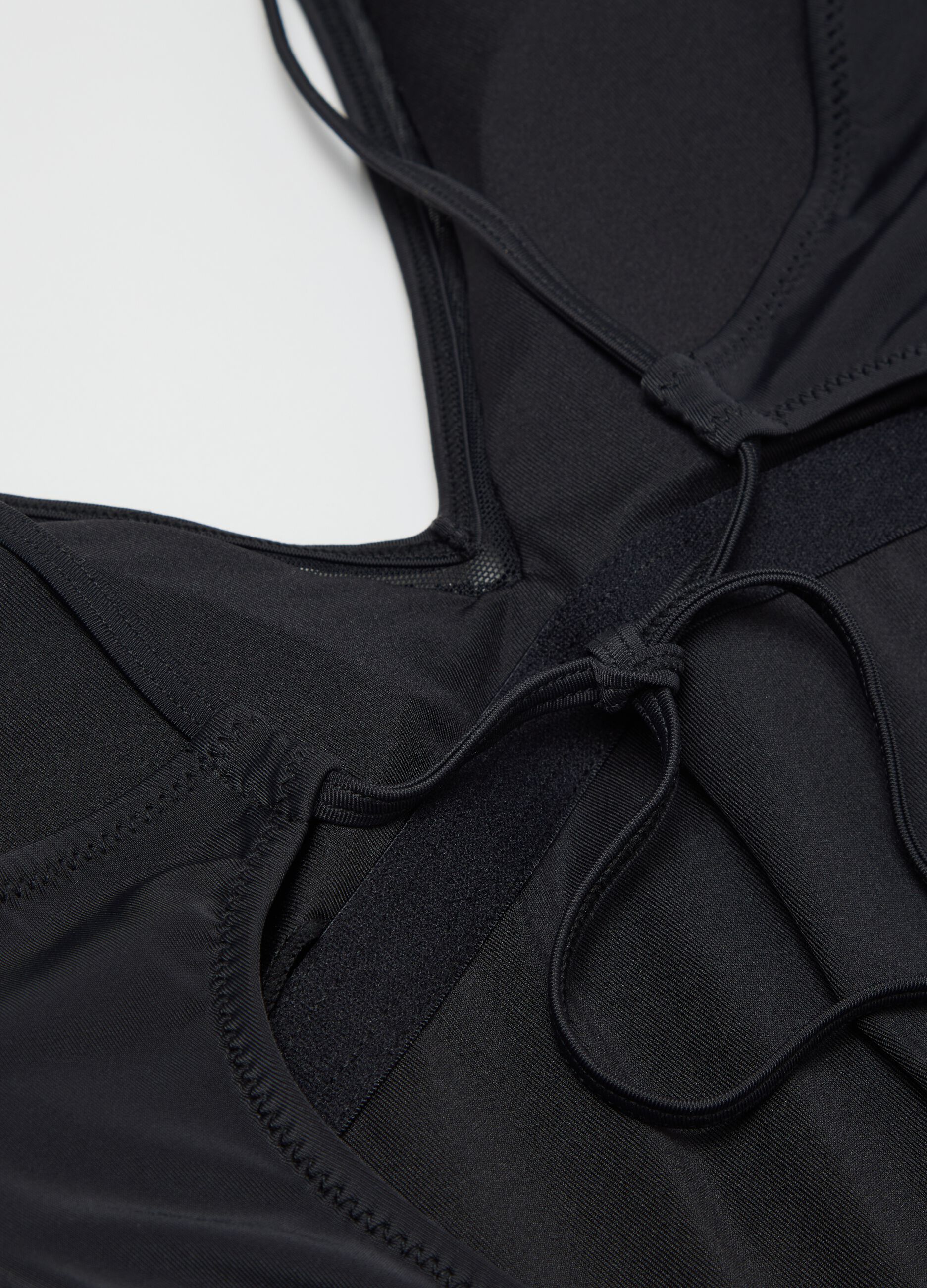 Black one-piece swimsuit with sequins