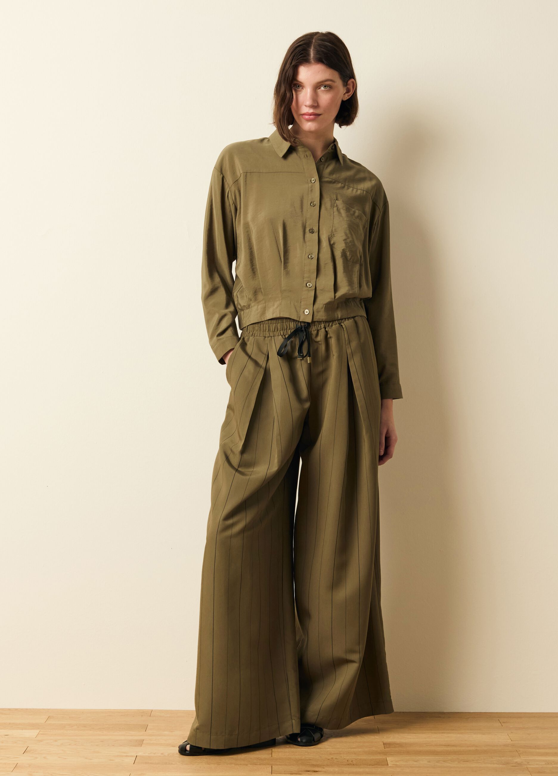 Wide-leg pinstriped trousers with darts