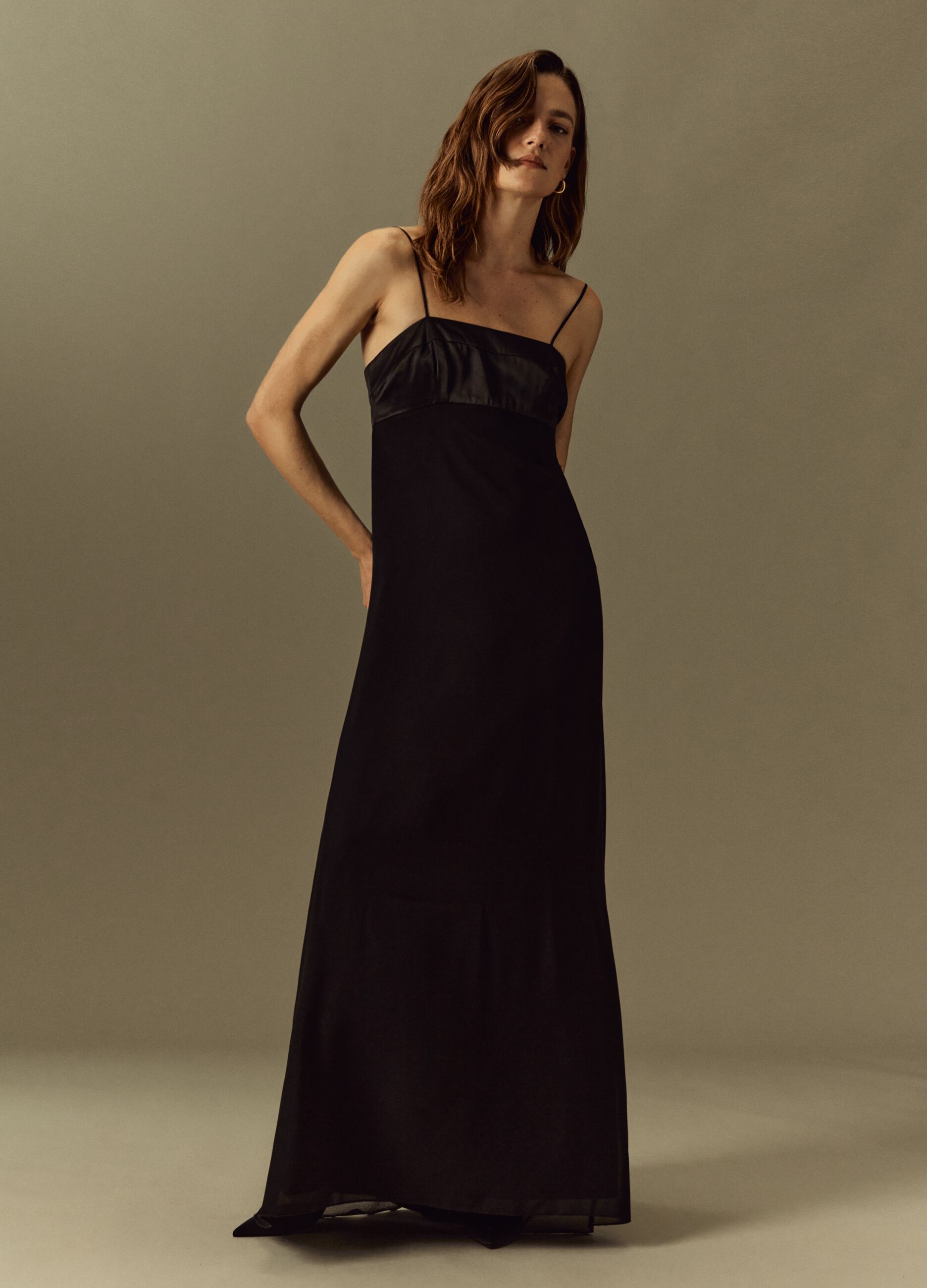 Long dress with spaghetti straps.