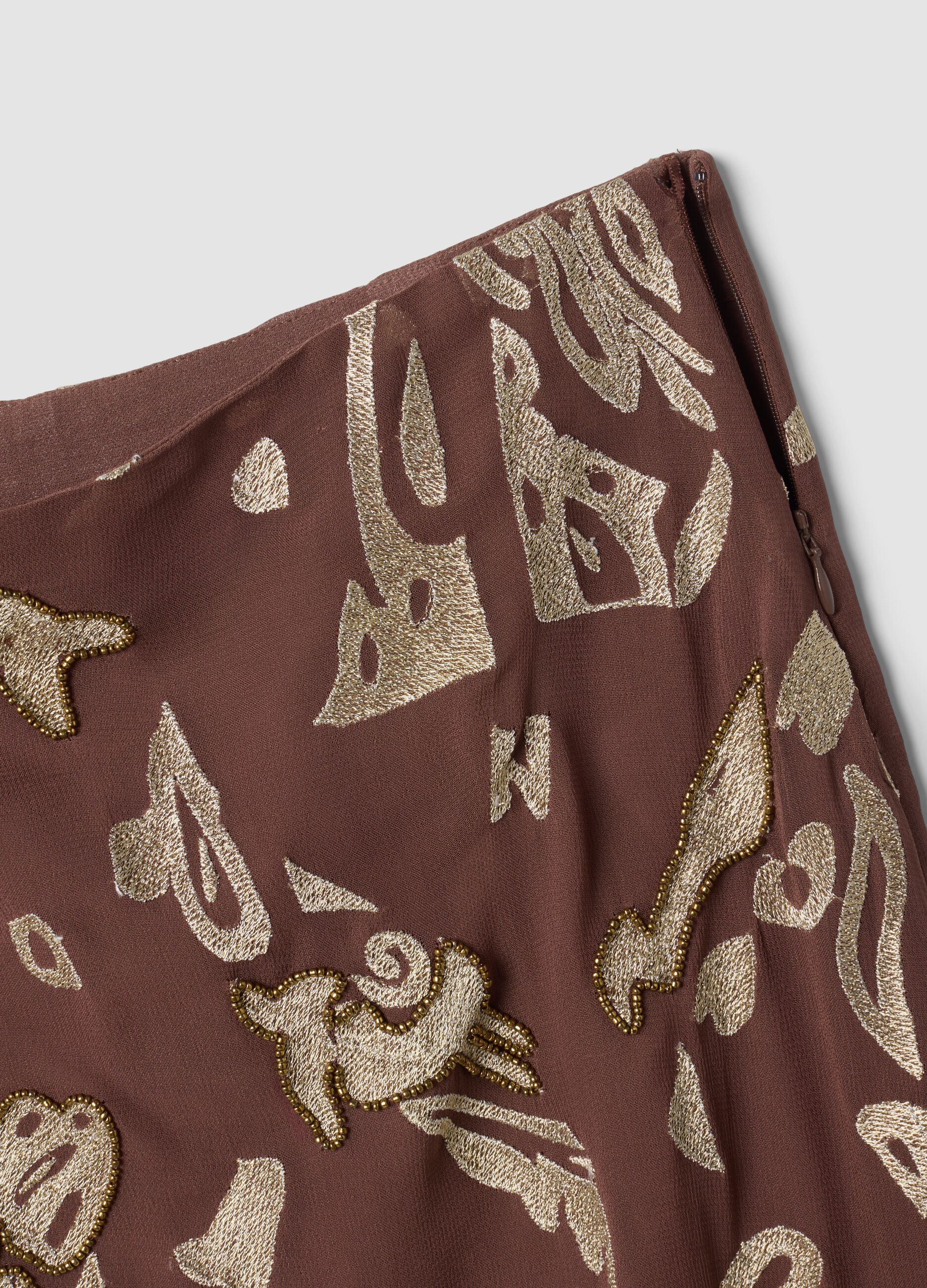 Brown midi skirt in pure viscose with embroidered motif